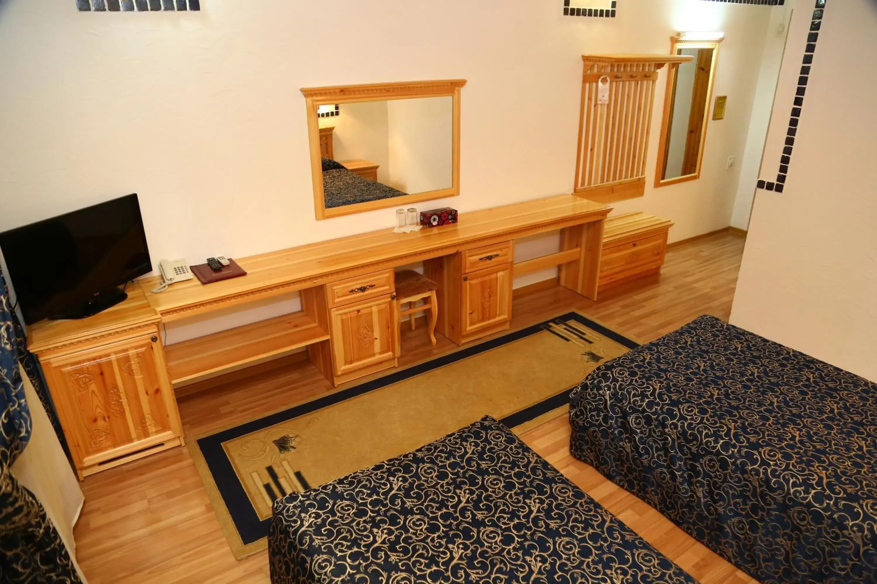 TV and multimedia, Bed in Malika Prime Hotel TV and multimedia, Bed in Malika Prime Hotel