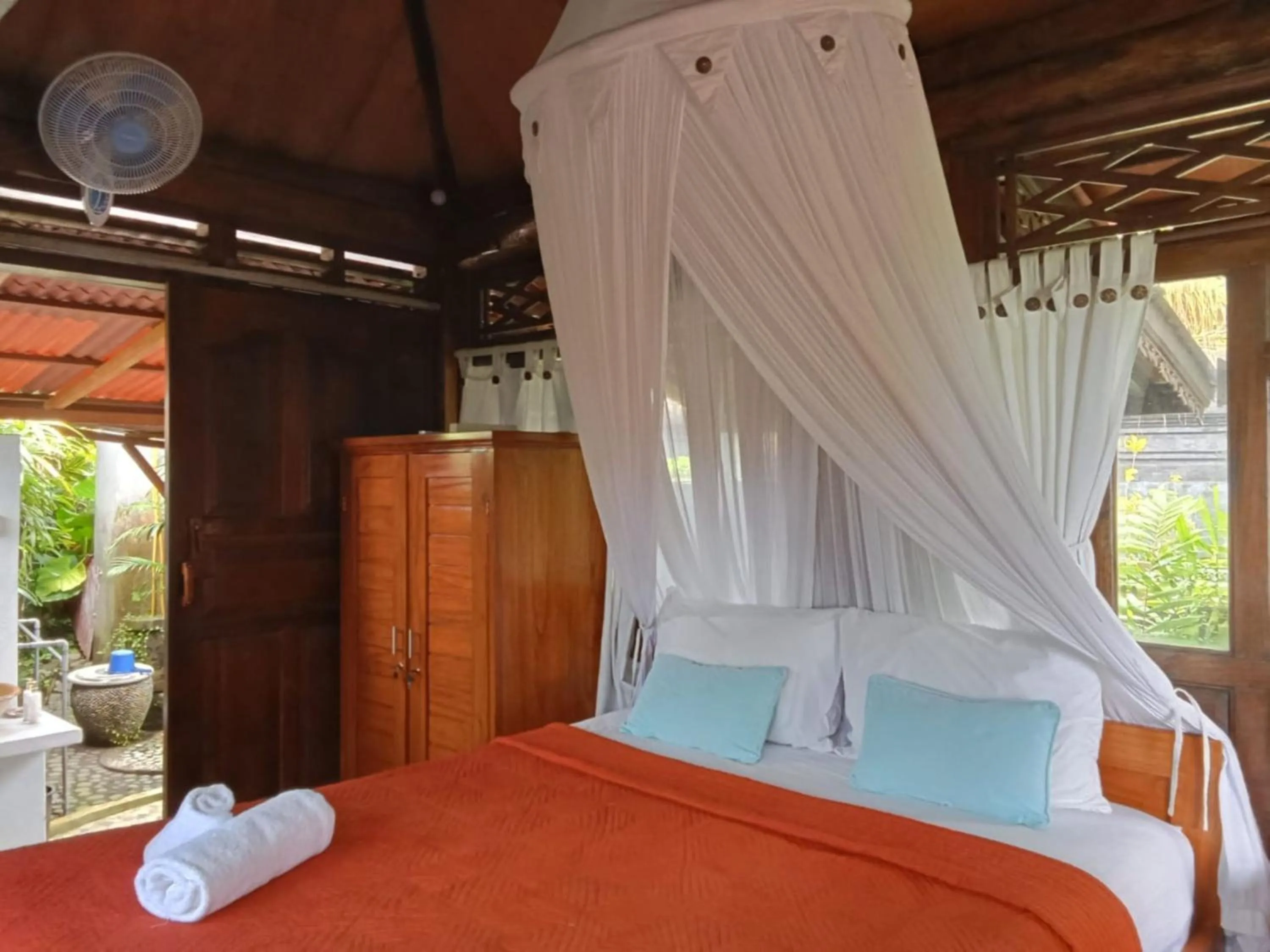 Bed in Pondok Pisces Bungalows Balian Beach