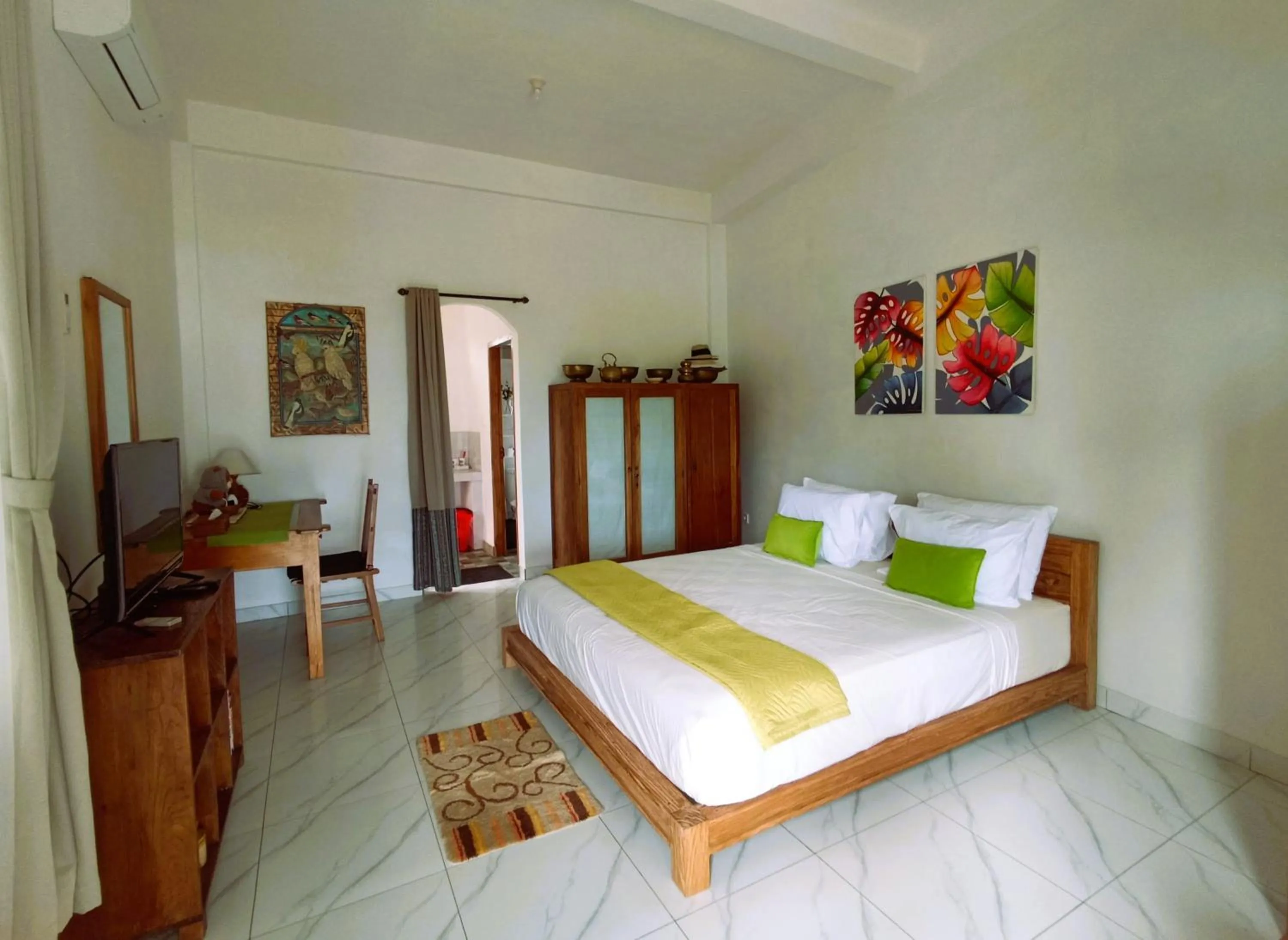 Bed in Pondok Pisces Bungalows Balian Beach