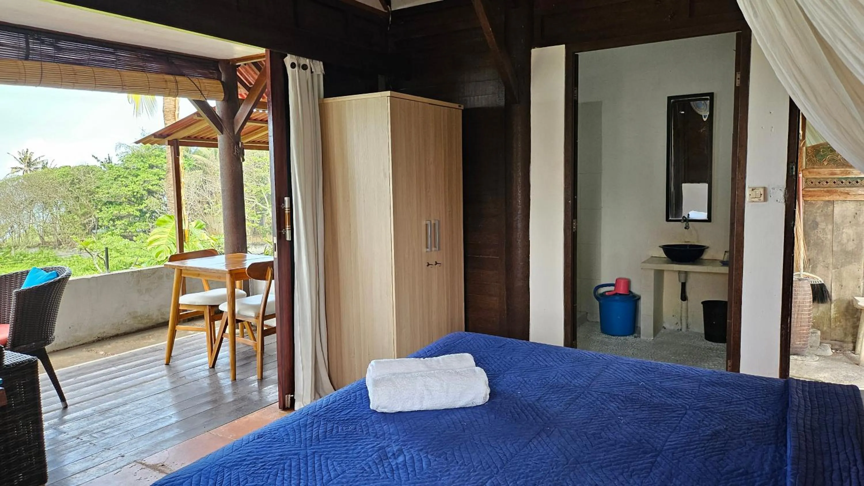 Bed in Pondok Pisces Bungalows Balian Beach