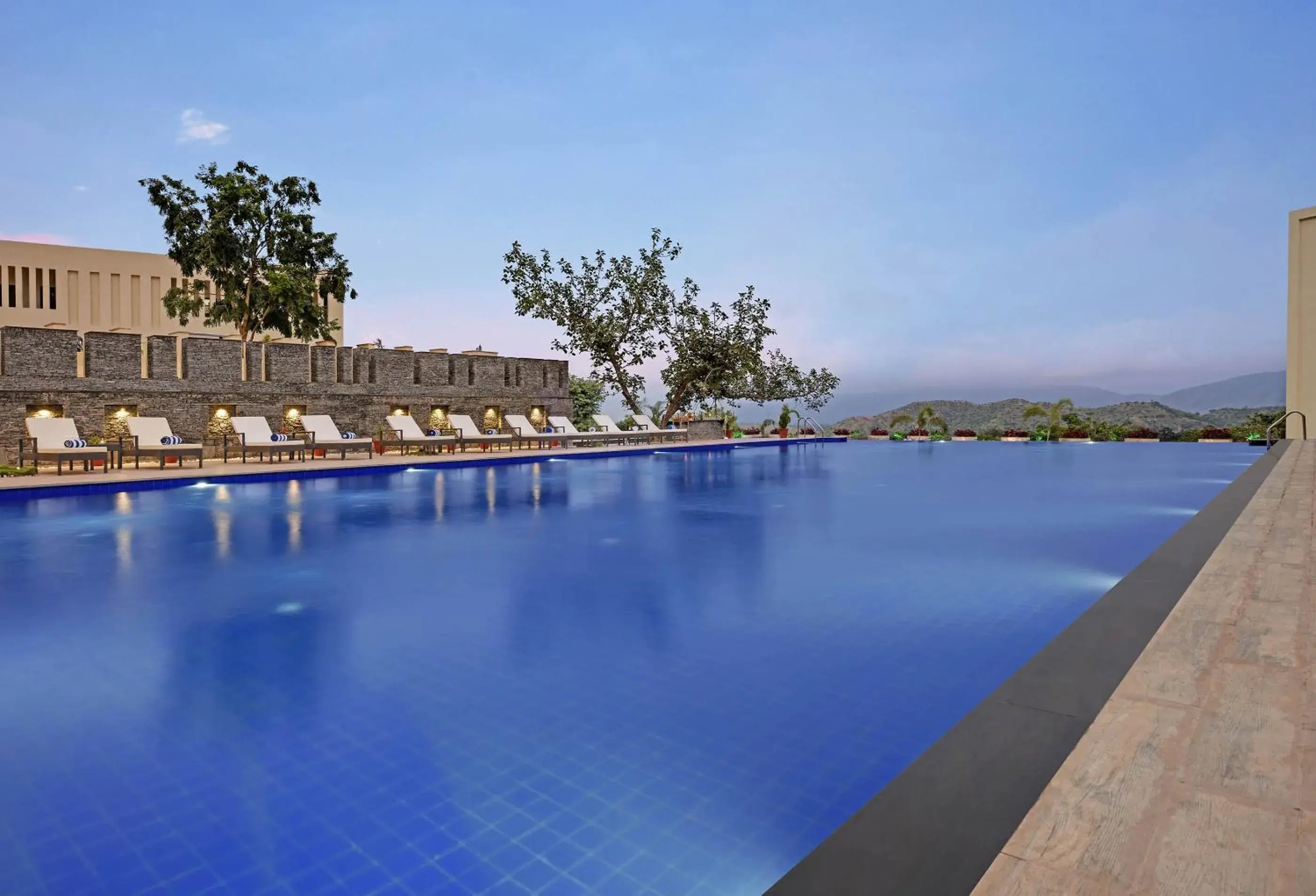 Swimming pool in The Kumbha Residency by Trulyy - A Luxury Resort and Spa Swimming pool in The Kumbha Residency by Trulyy - A Luxury Resort and Spa