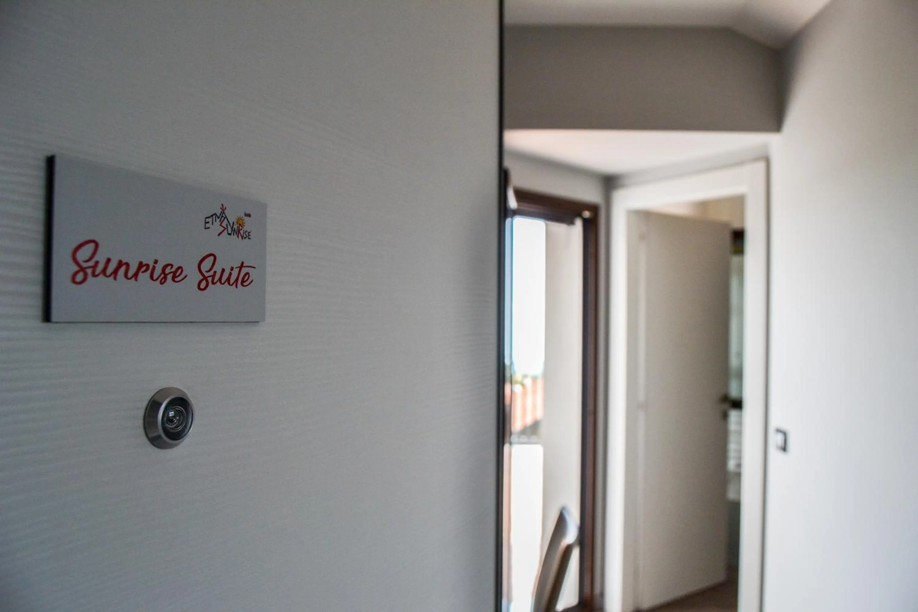 Logo/Certificate/Sign in Etna Sunrise b&b