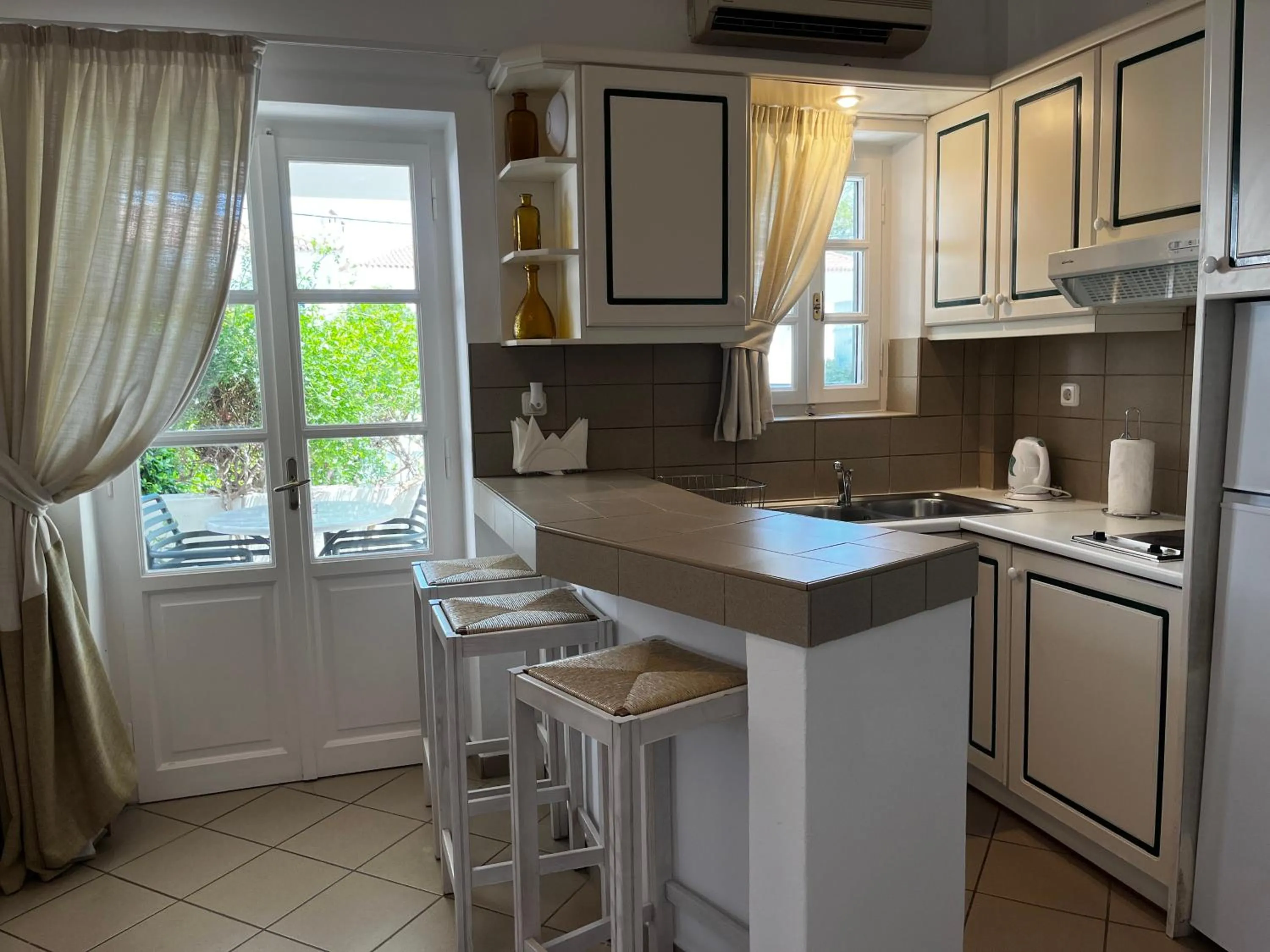 Kitchen or kitchenette in Nissia Traditional Residences Spetses