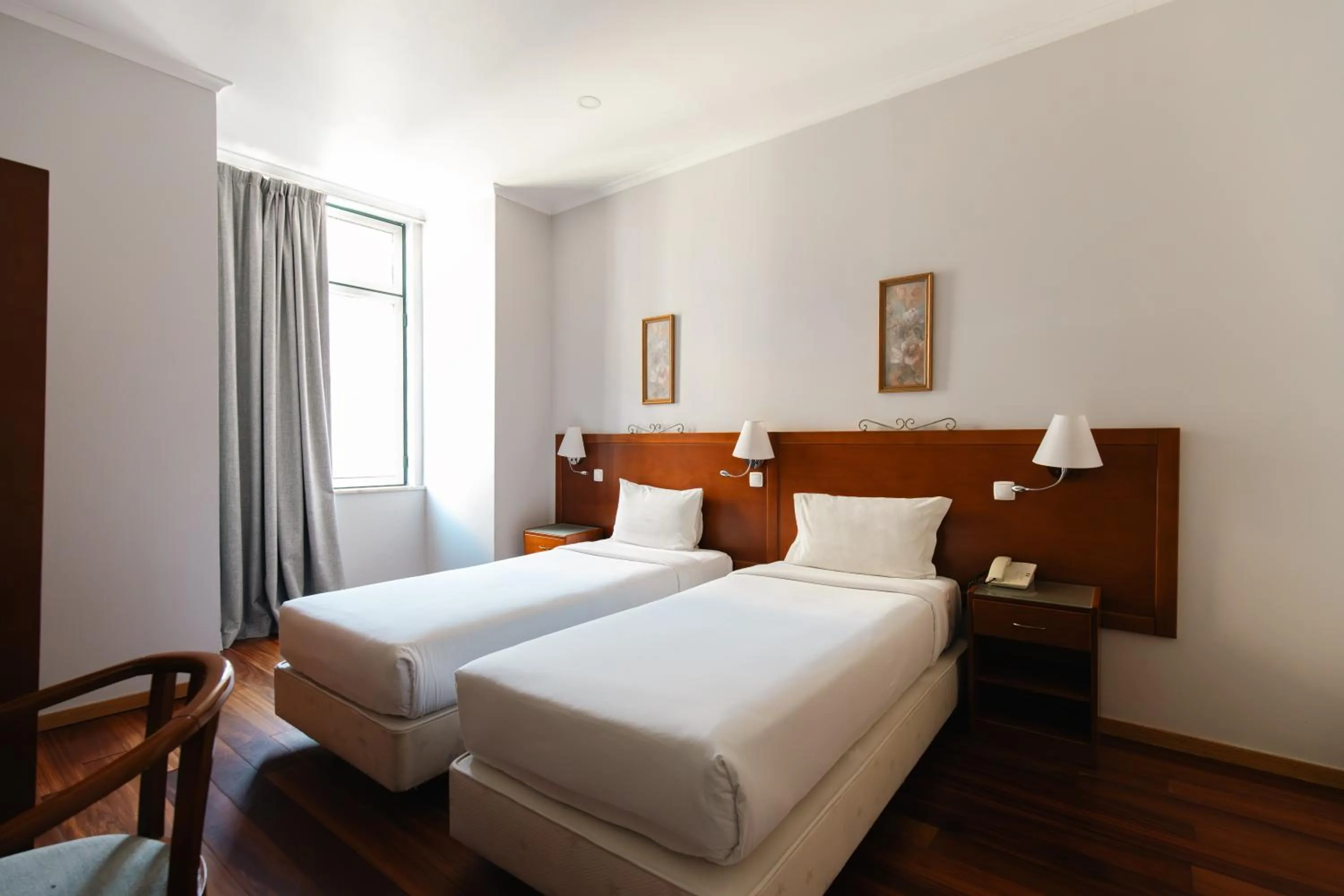 Bed in Grande Pensao Residencial Alcobia