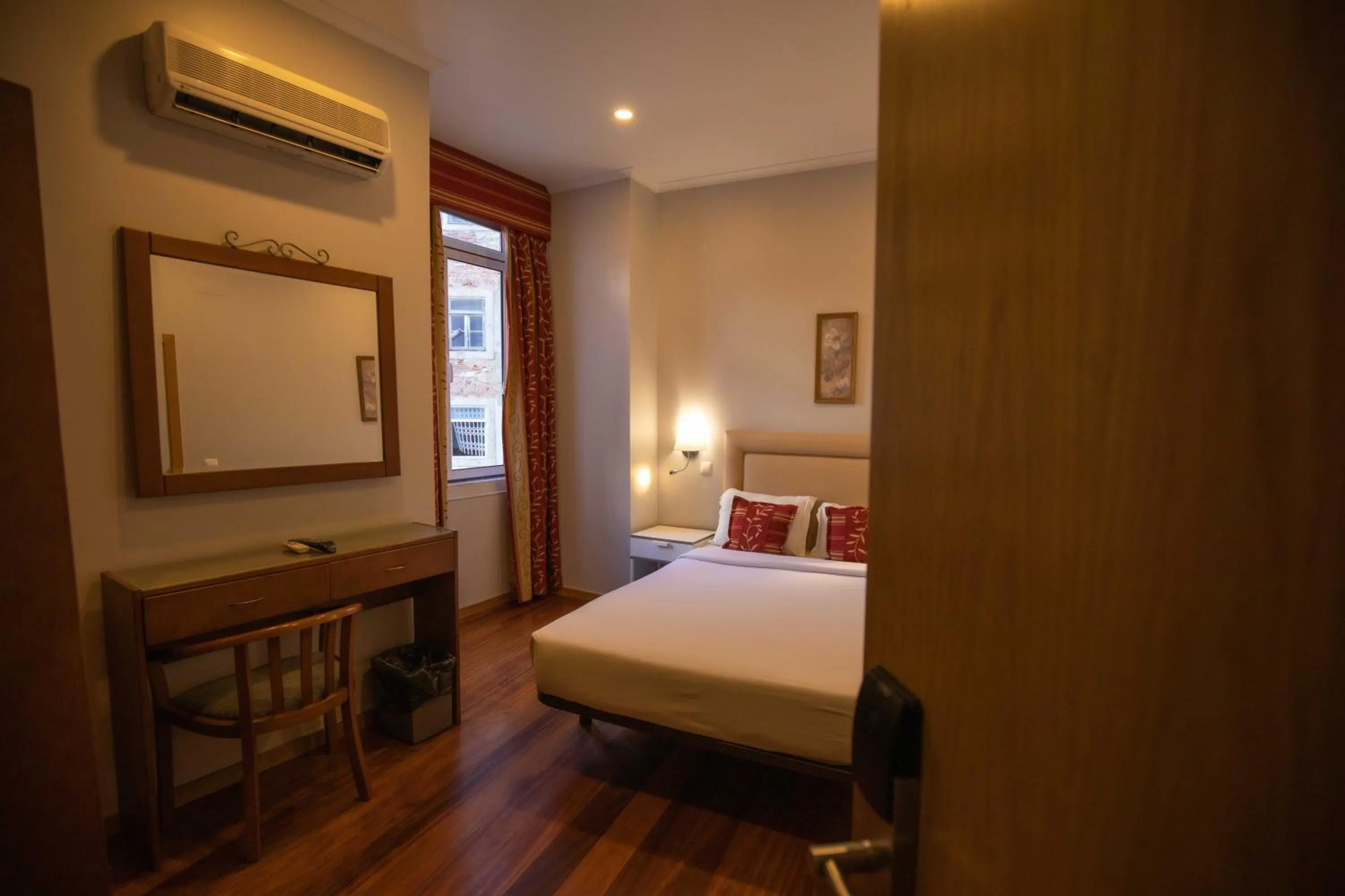 Bed in Grande Pensao Residencial Alcobia