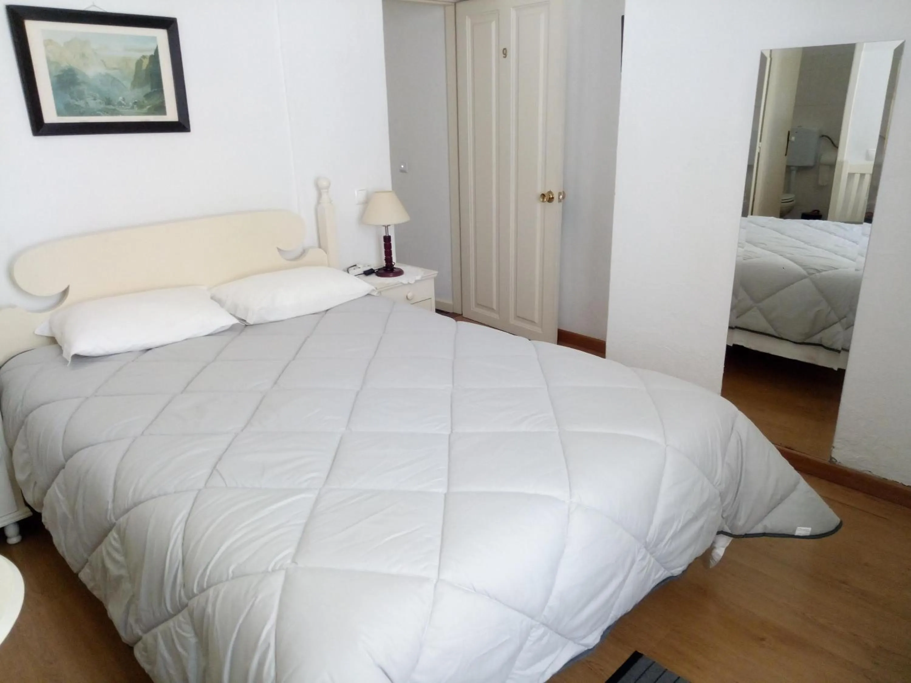 Bed in Pensao Residencial Vila Teresinha