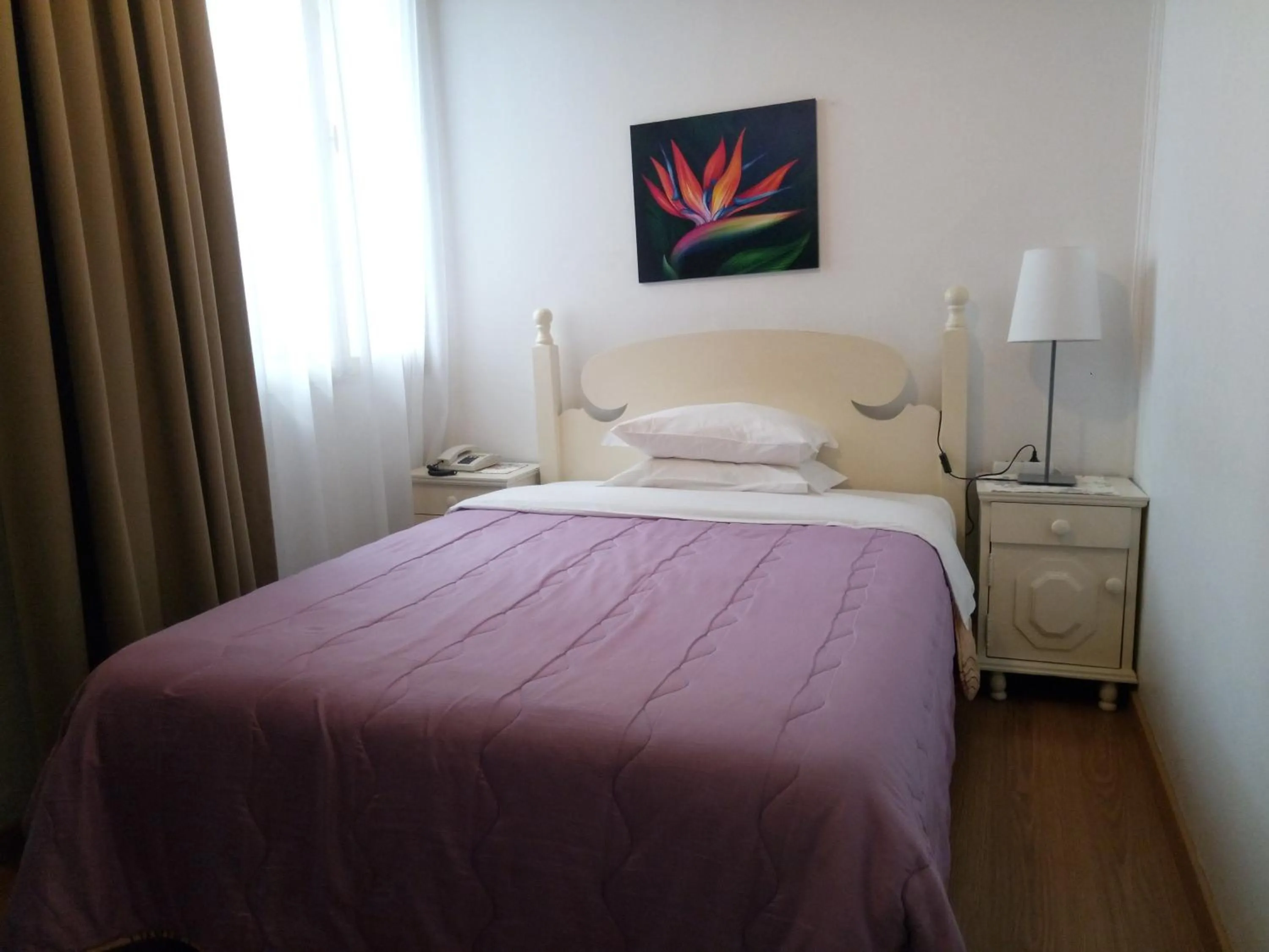 Bed in Pensao Residencial Vila Teresinha