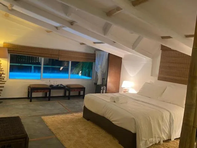 Bed in Bliss Hotel Praslin