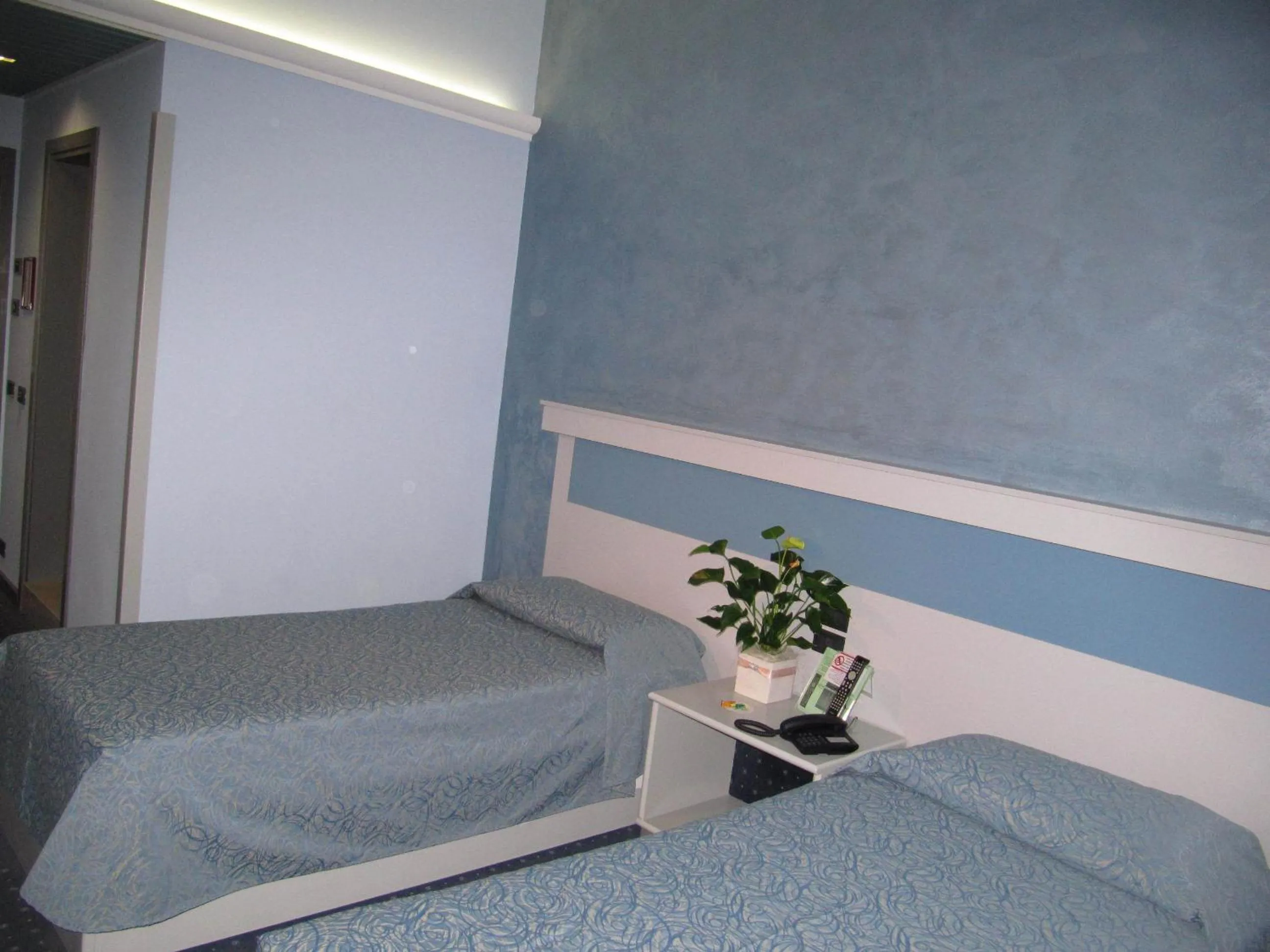 Bedroom in Hotel Garden