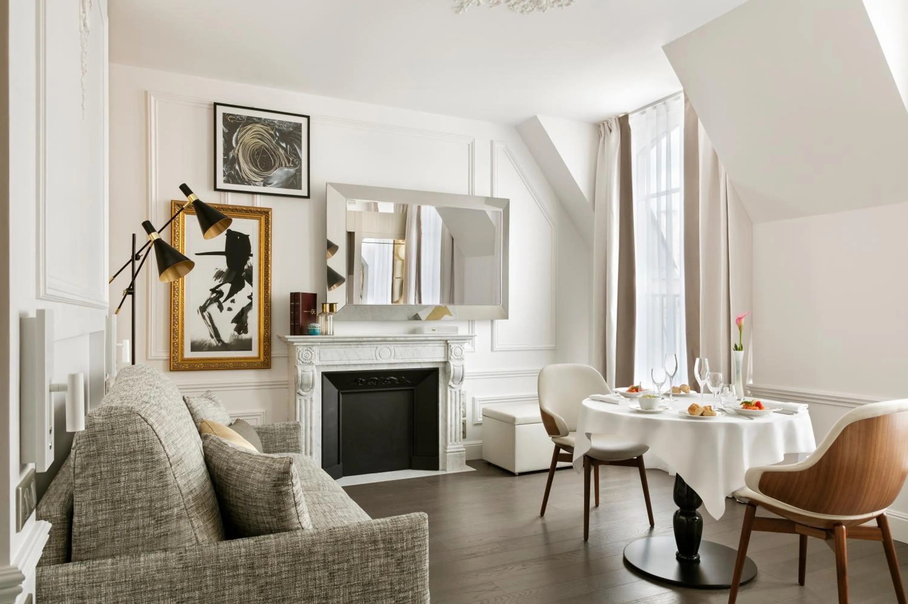 Living room in La Clef Champs-Élysées Paris by The Crest Collection