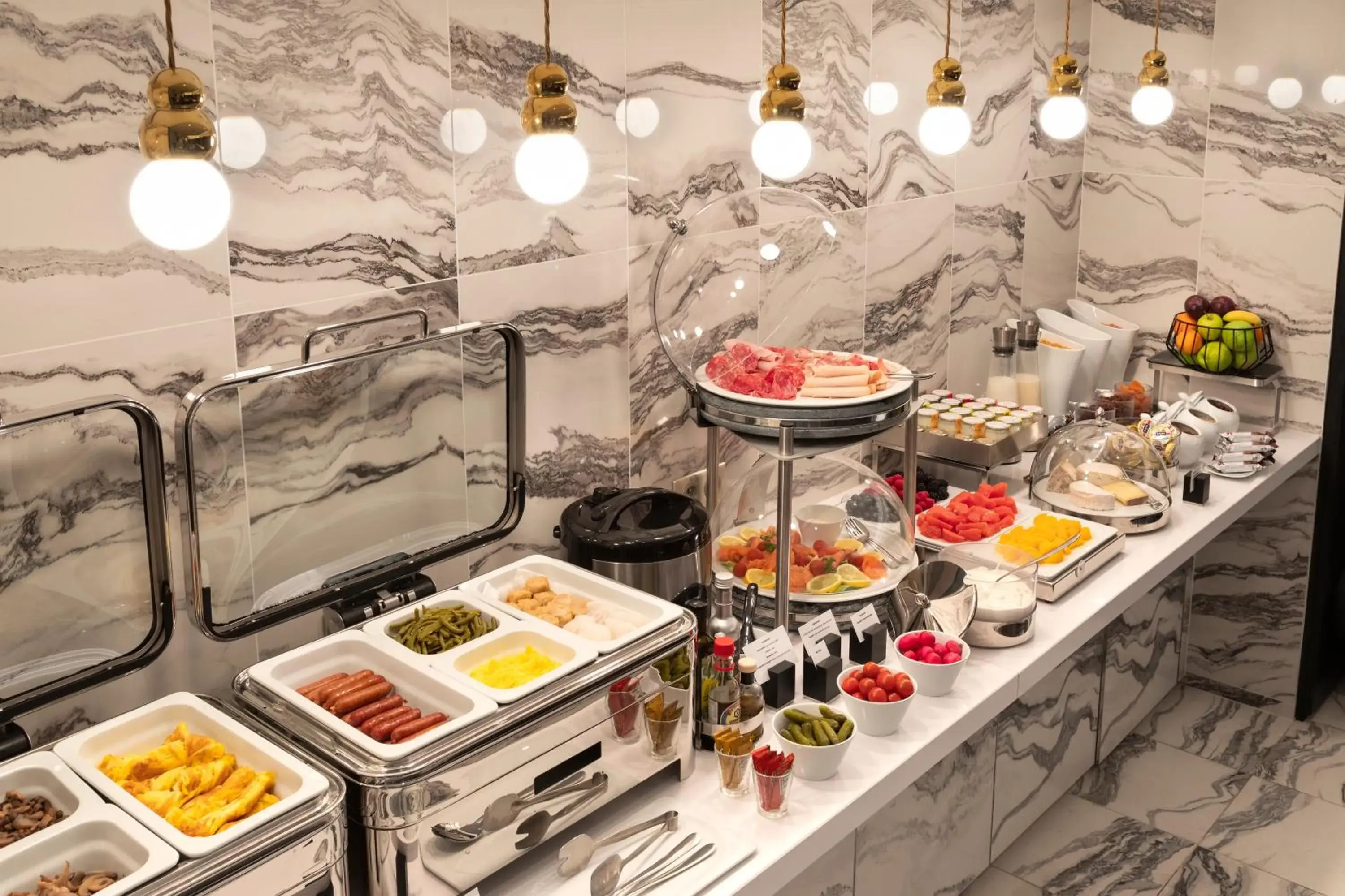 Buffet breakfast in La Clef Champs-Élysées Paris by The Crest Collection Buffet breakfast in La Clef Champs-Élysées Paris by The Crest Collection