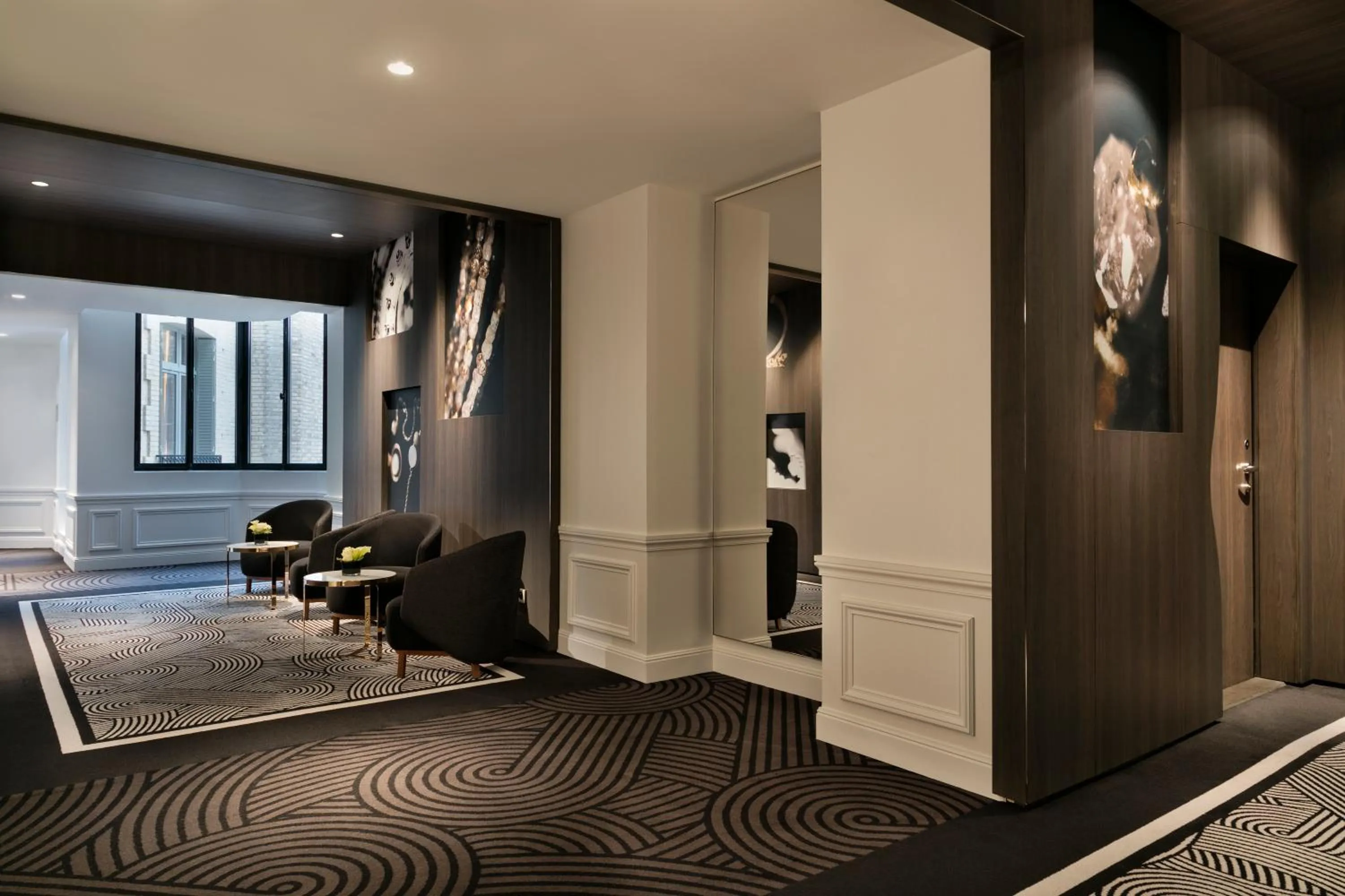 Seating area in La Clef Champs-Élysées Paris by The Crest Collection