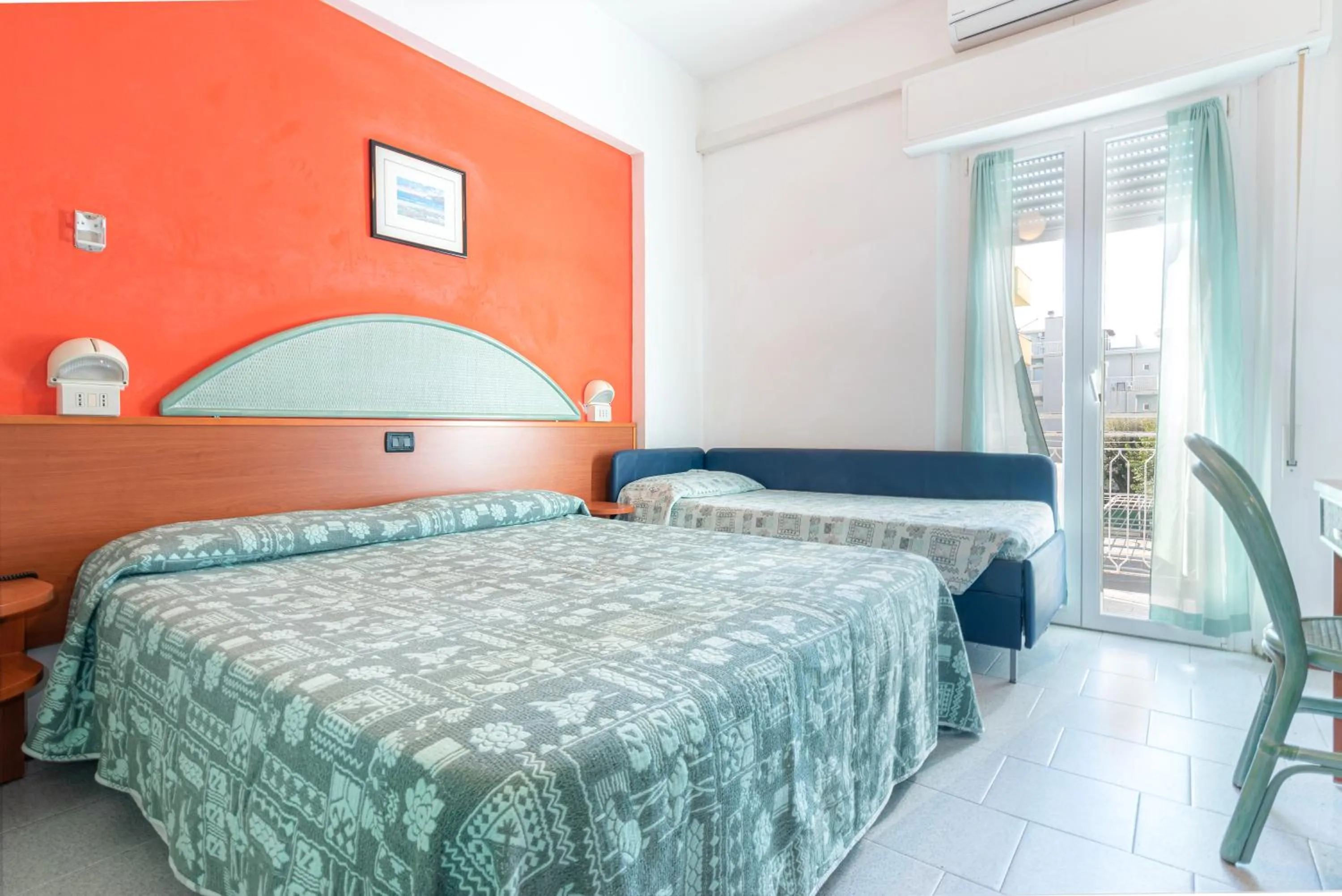 Bed in Hotel Diamond