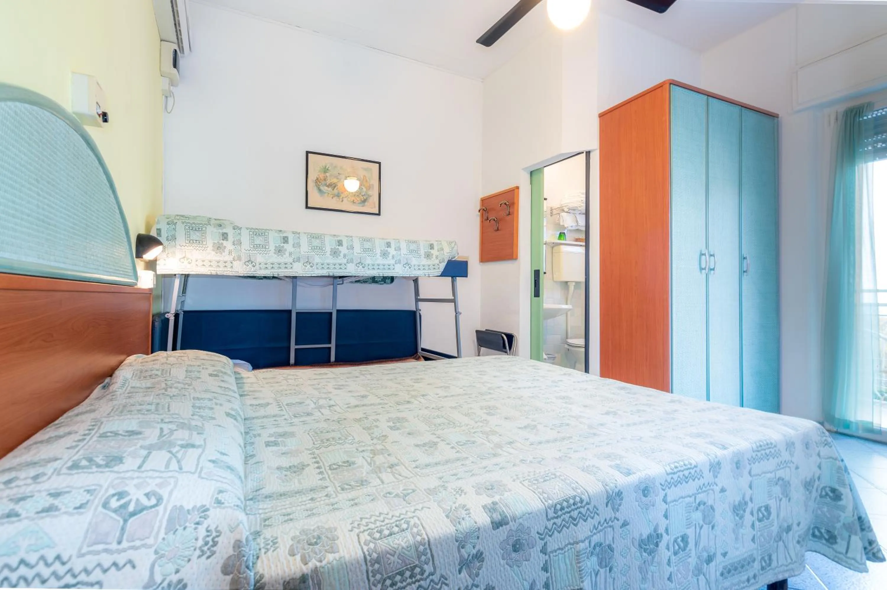 Bed in Hotel Diamond