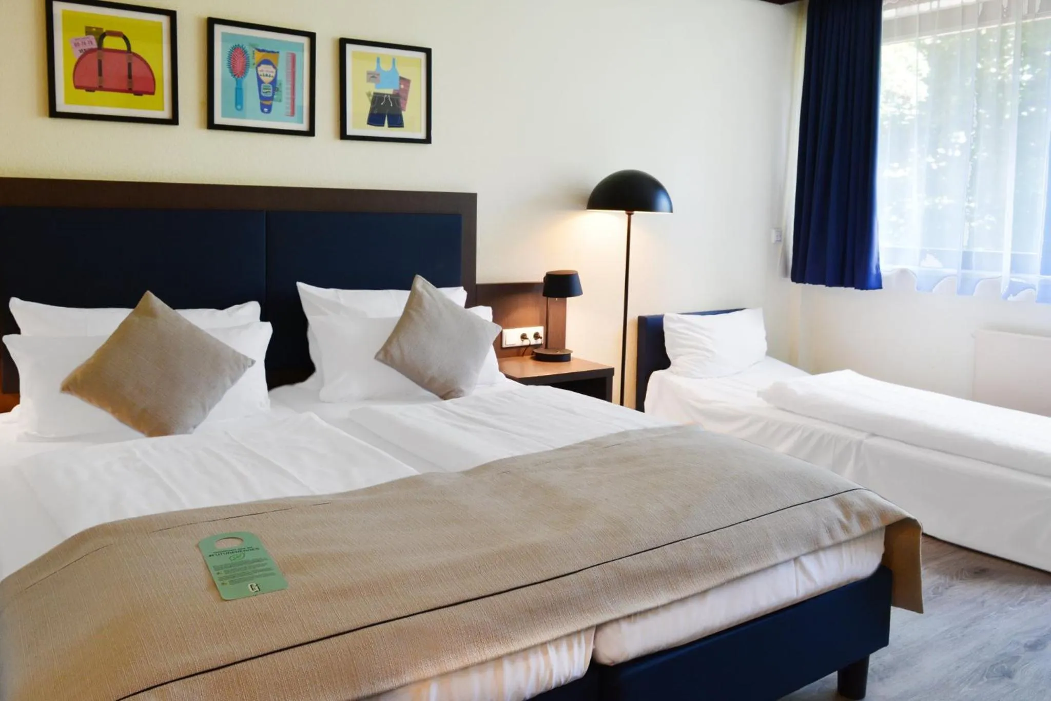 Photo of the whole room, Bed in Garner Hotel Frankfurt - Palmengarten by IHG