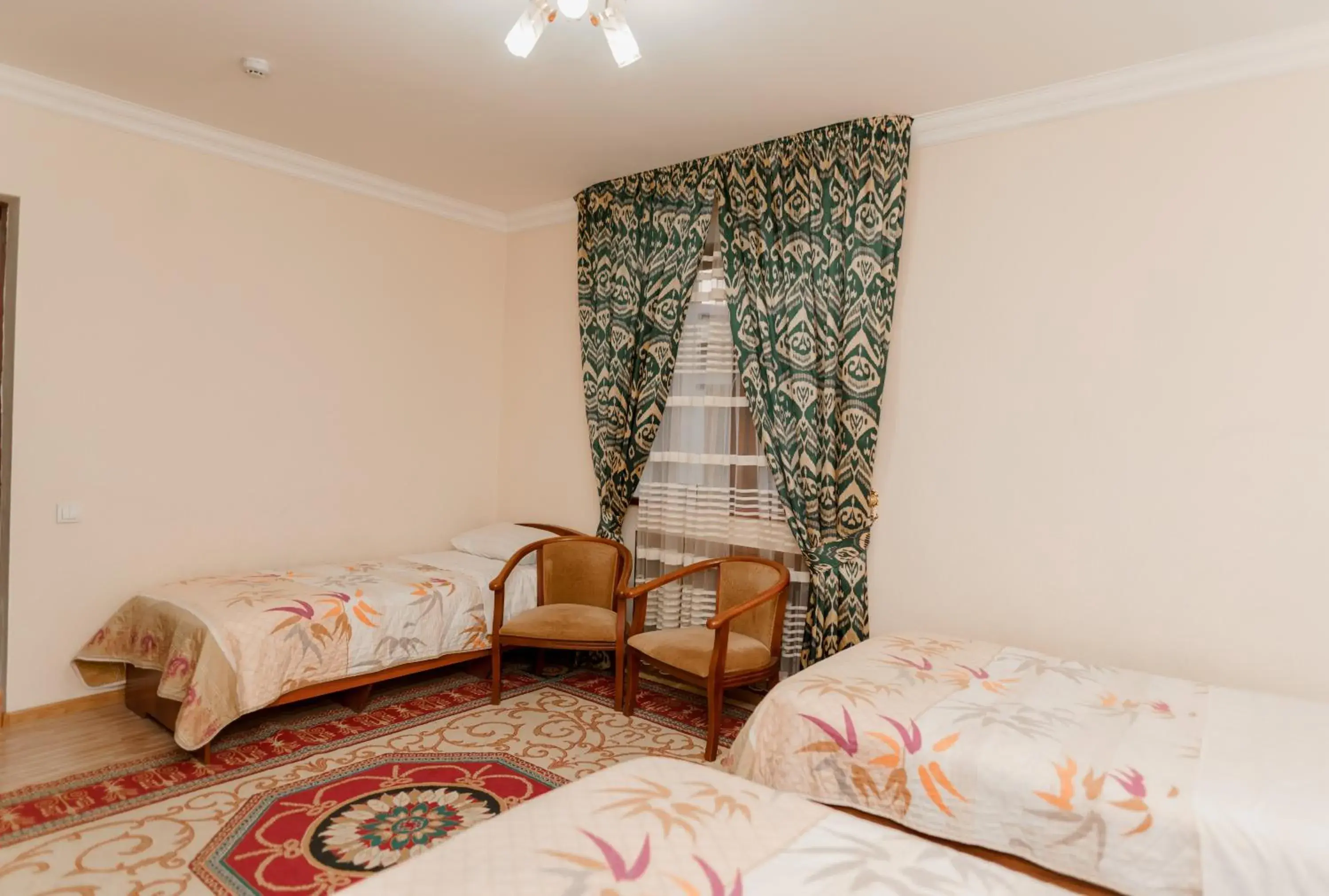 Standard Triple Room in Hotel Dilshoda Standard Triple Room in Hotel Dilshoda