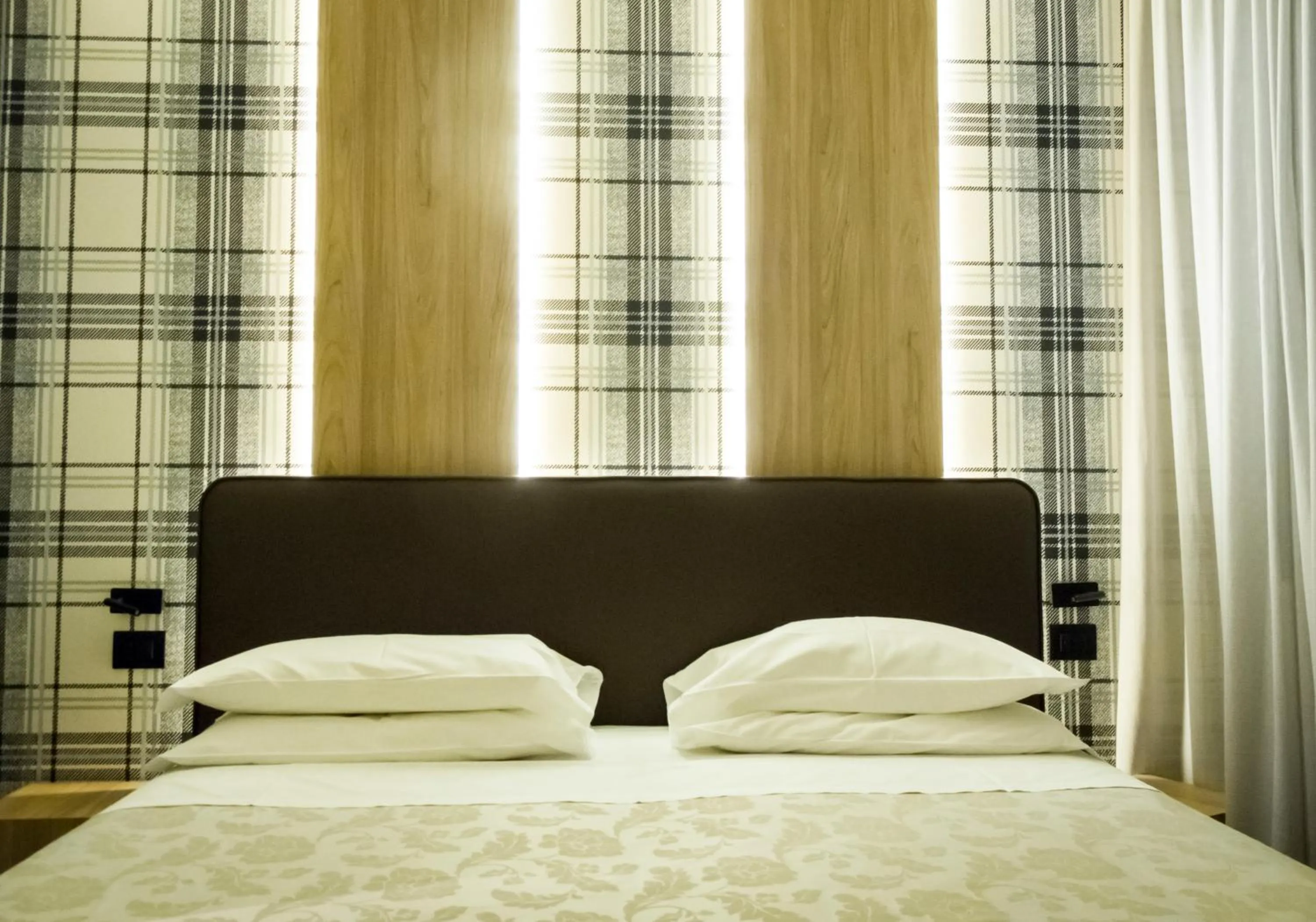 Bed in Hotel Ombra