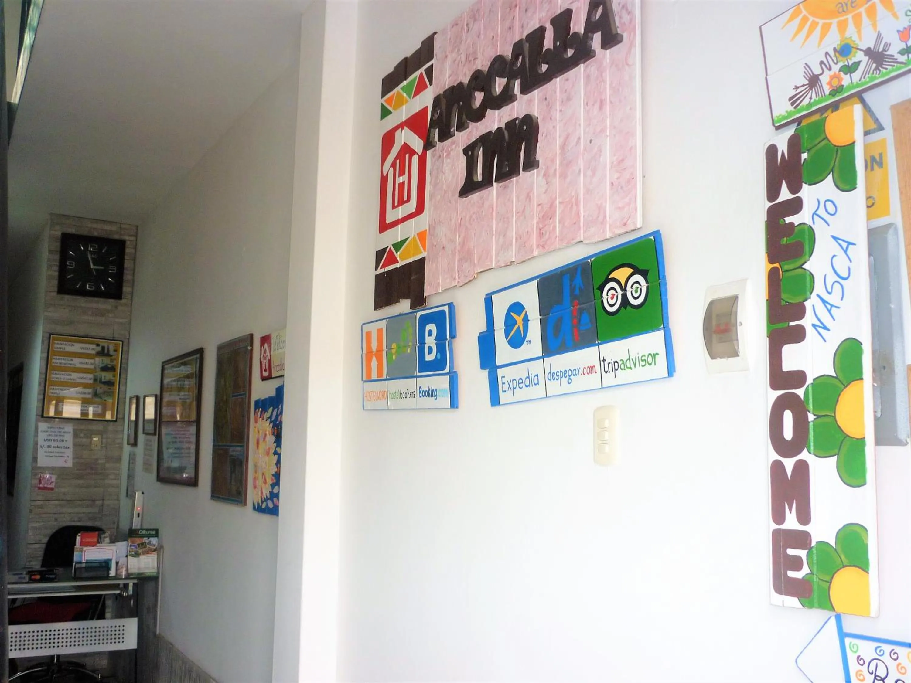 Property logo or sign in Anccalla Inn Guesthouse