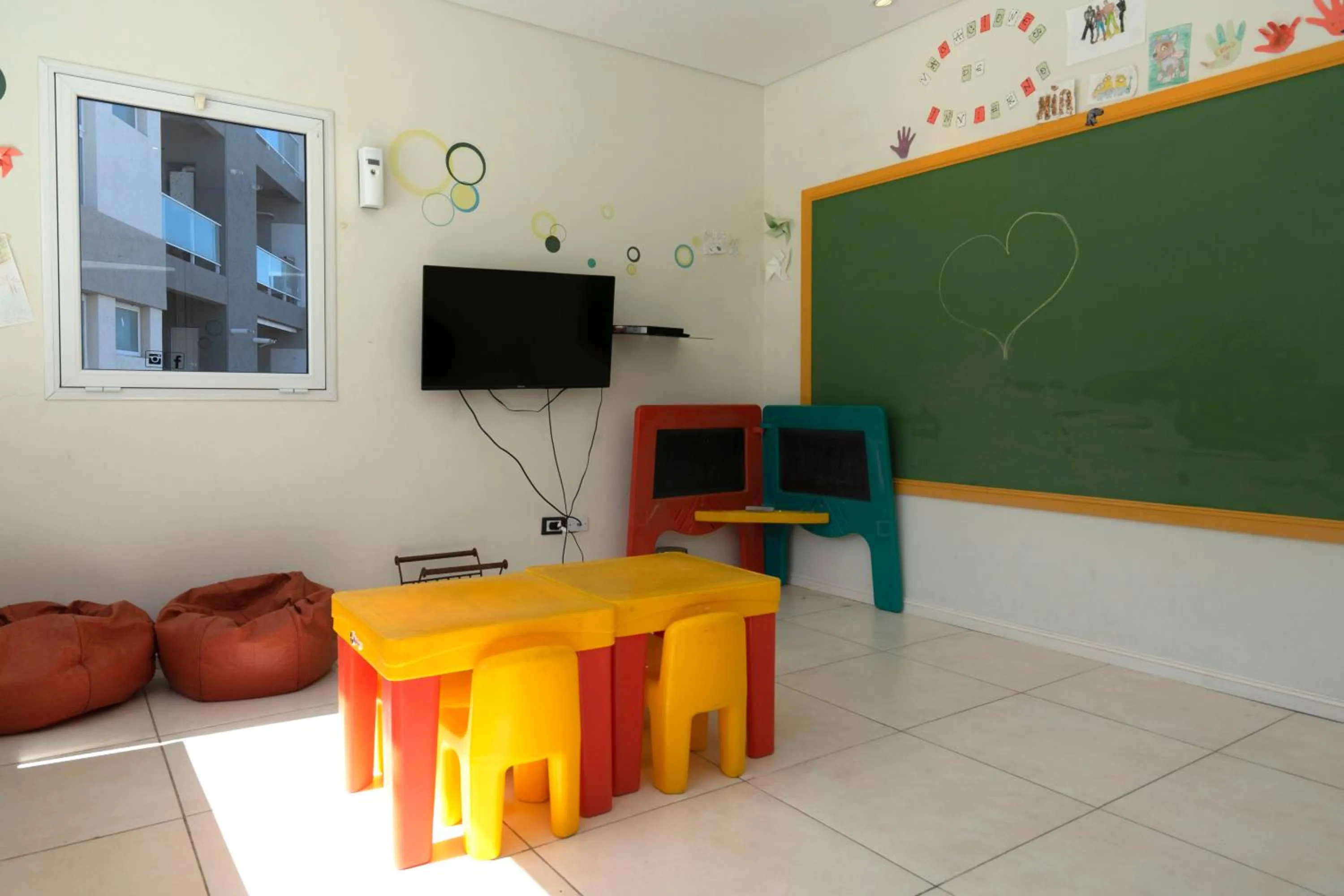 Communal lounge/ TV room in Valeria Playa Apart