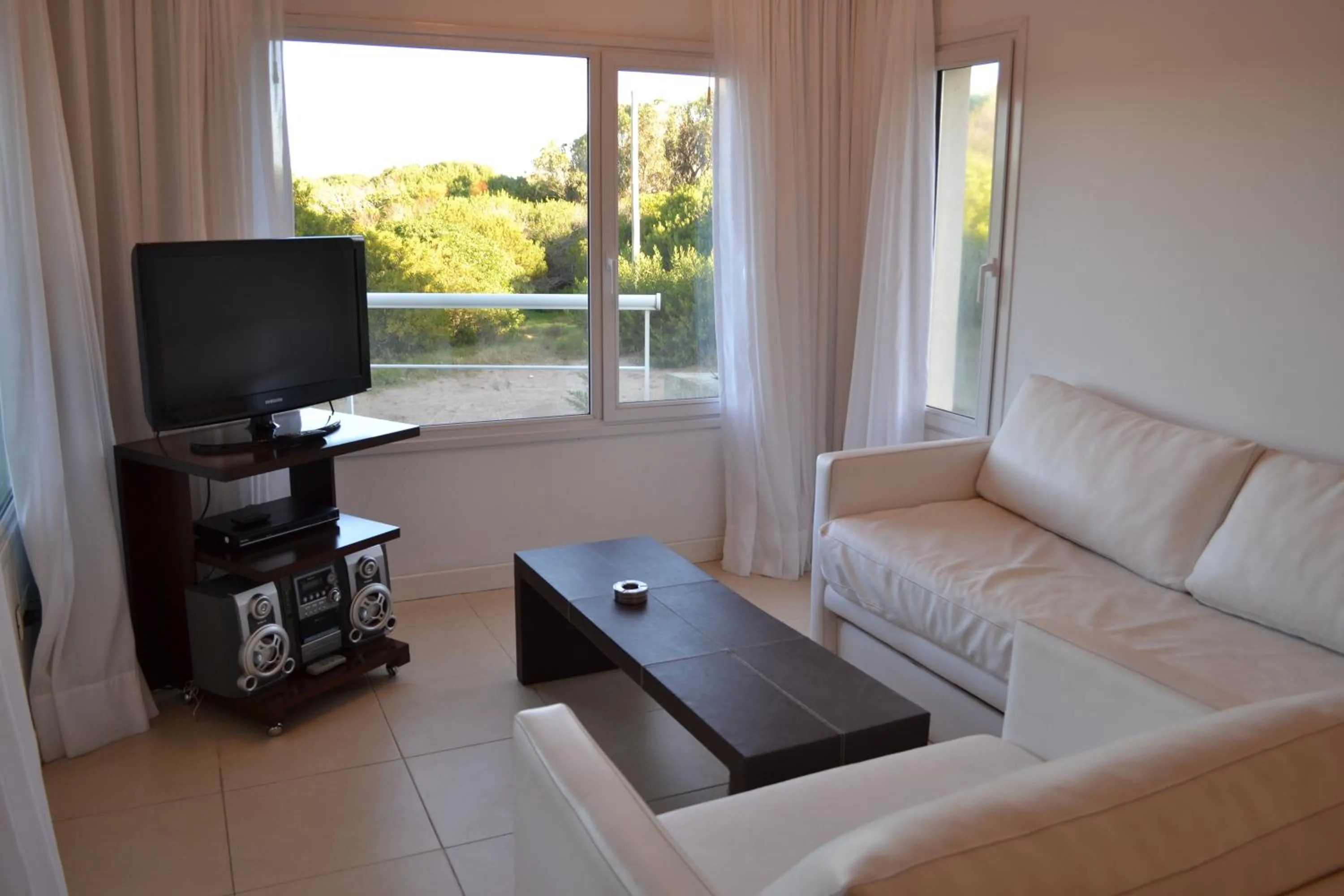 Living room in Valeria Playa Apart