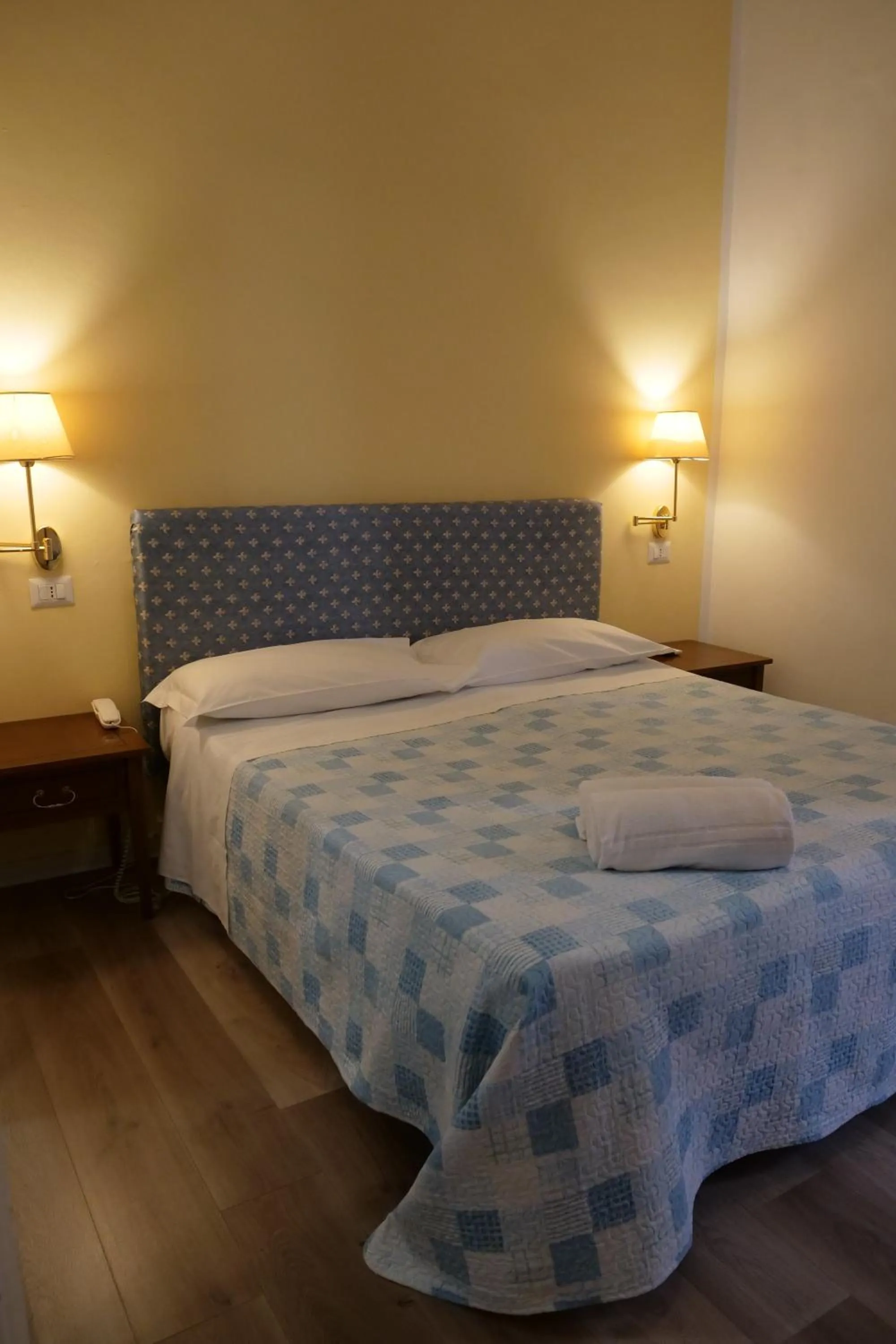 Bed in Hotel Elios Tao