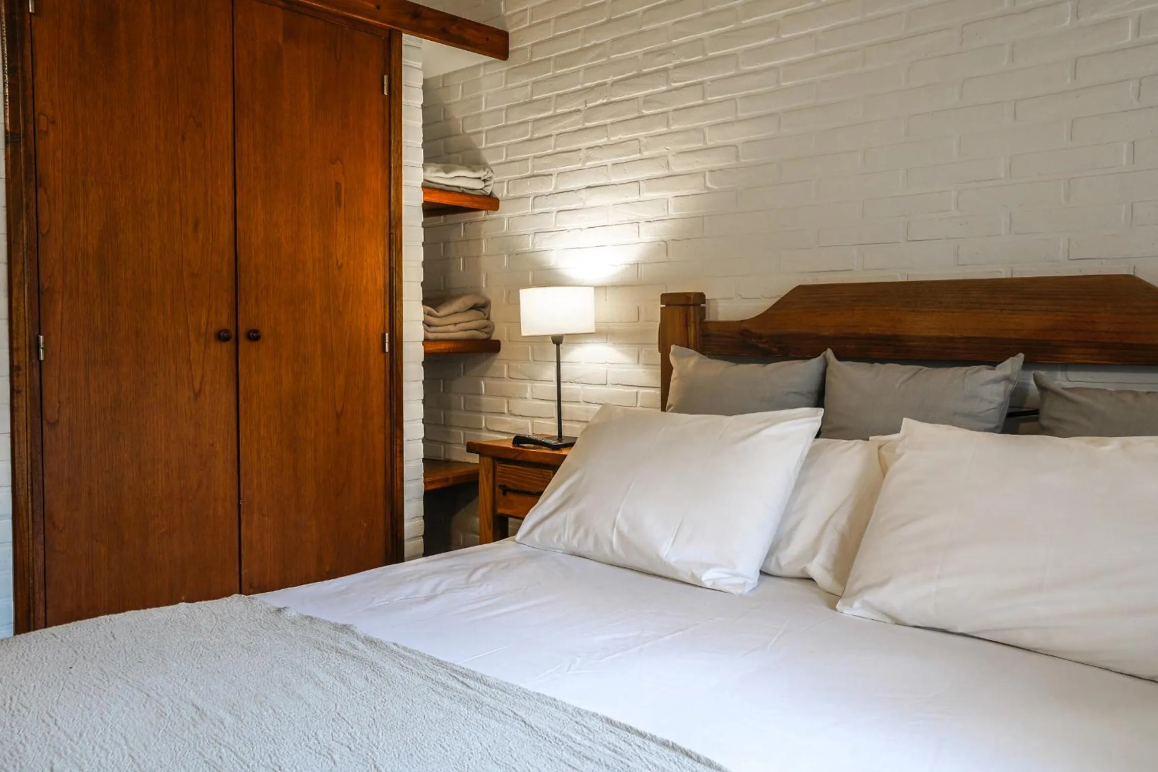 Bed in Valeria House Rental Suites