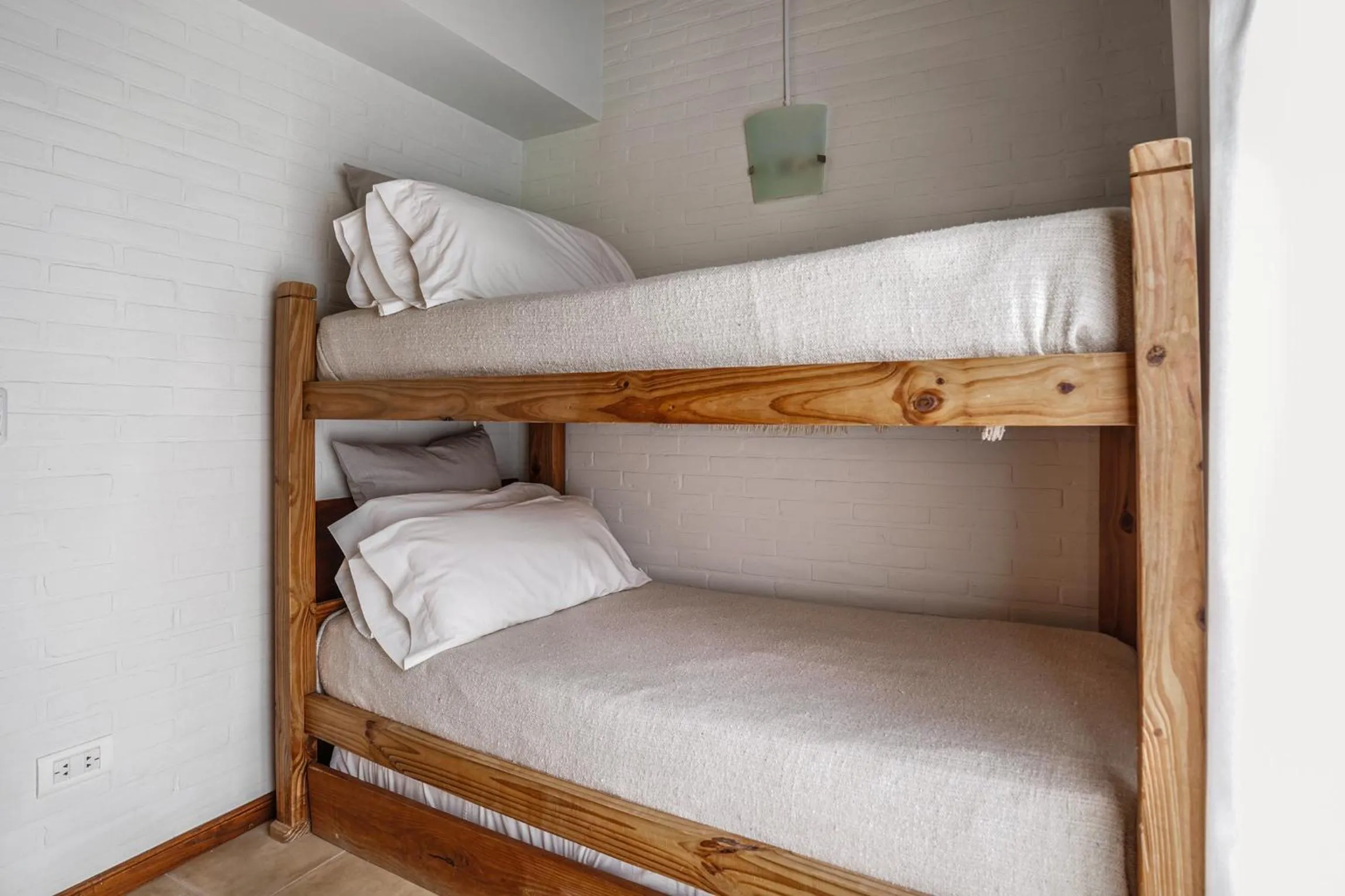 Bed in Valeria House Rental Suites