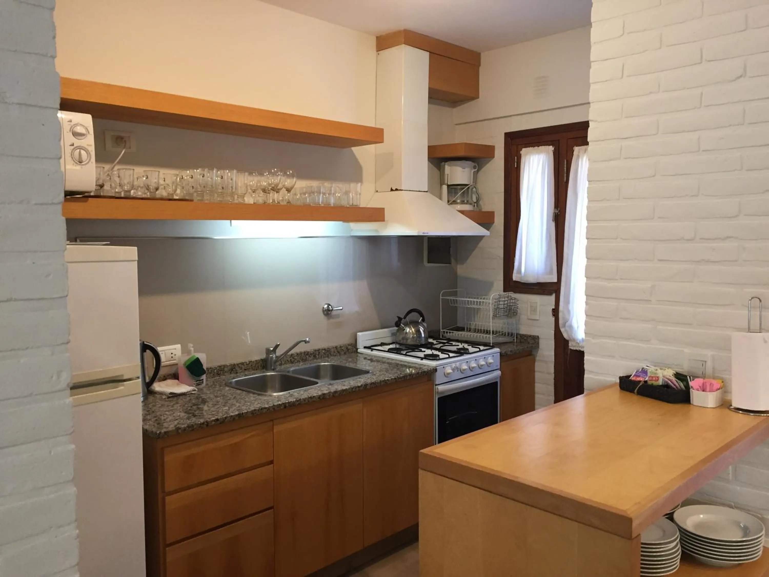 Kitchen or kitchenette in Valeria House Rental Suites