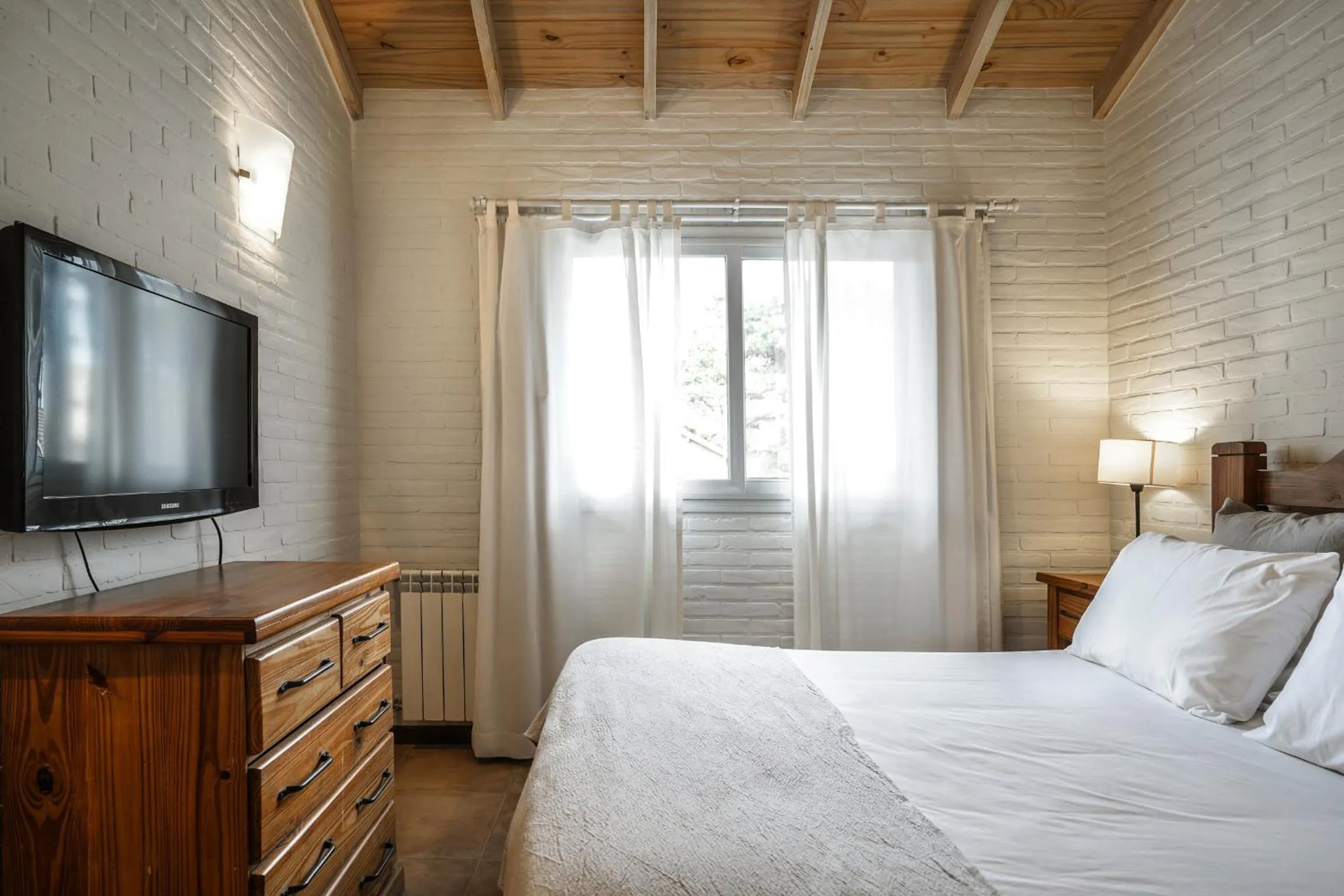 Bed in Valeria House Rental Suites