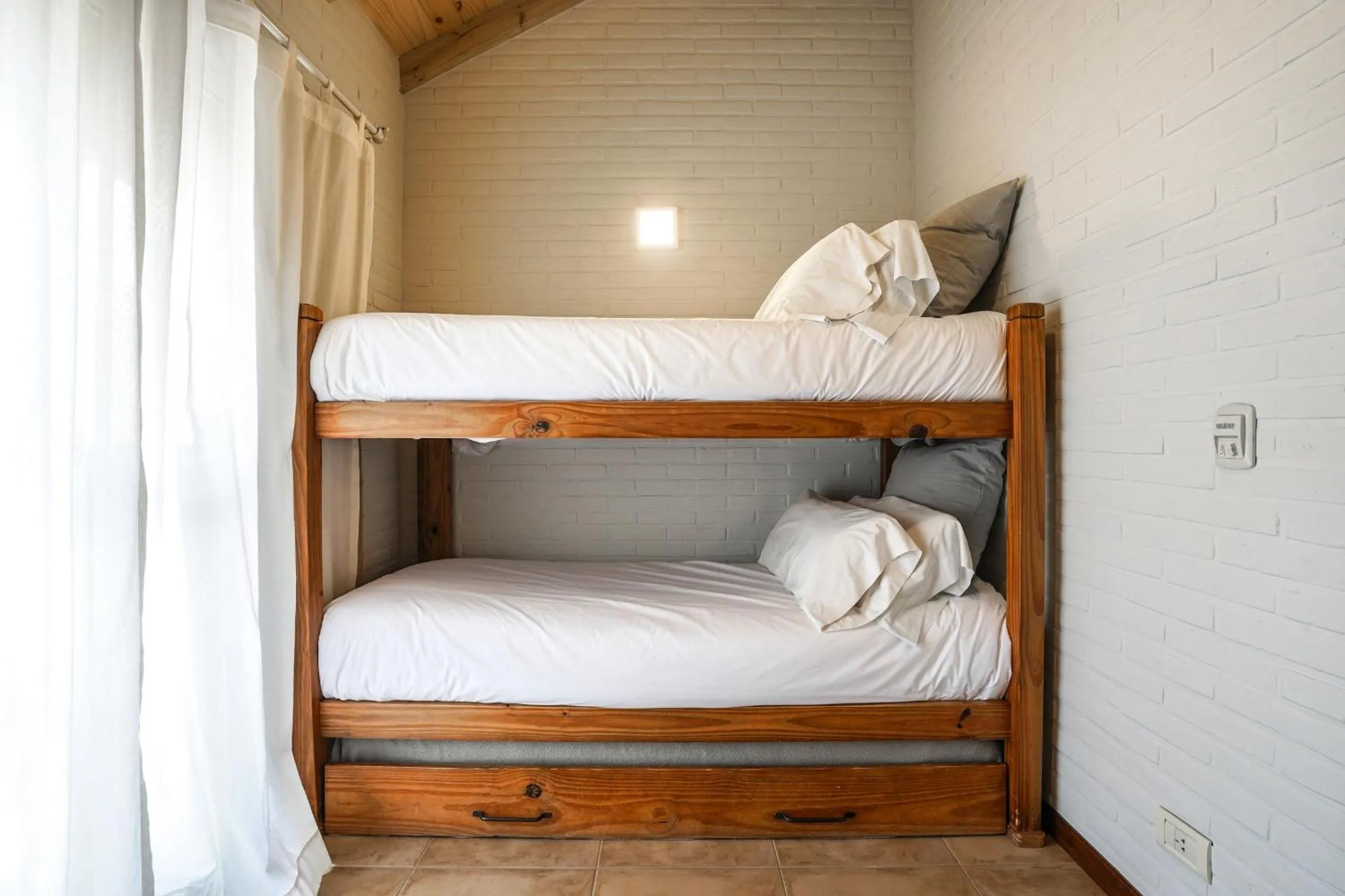 Bed in Valeria House Rental Suites