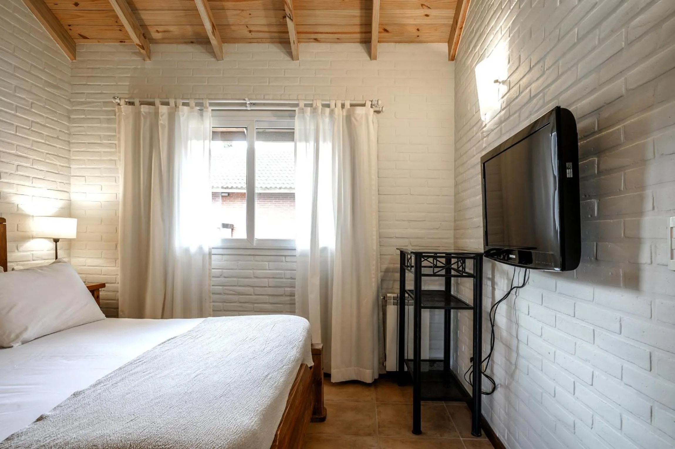 Bed in Valeria House Rental Suites