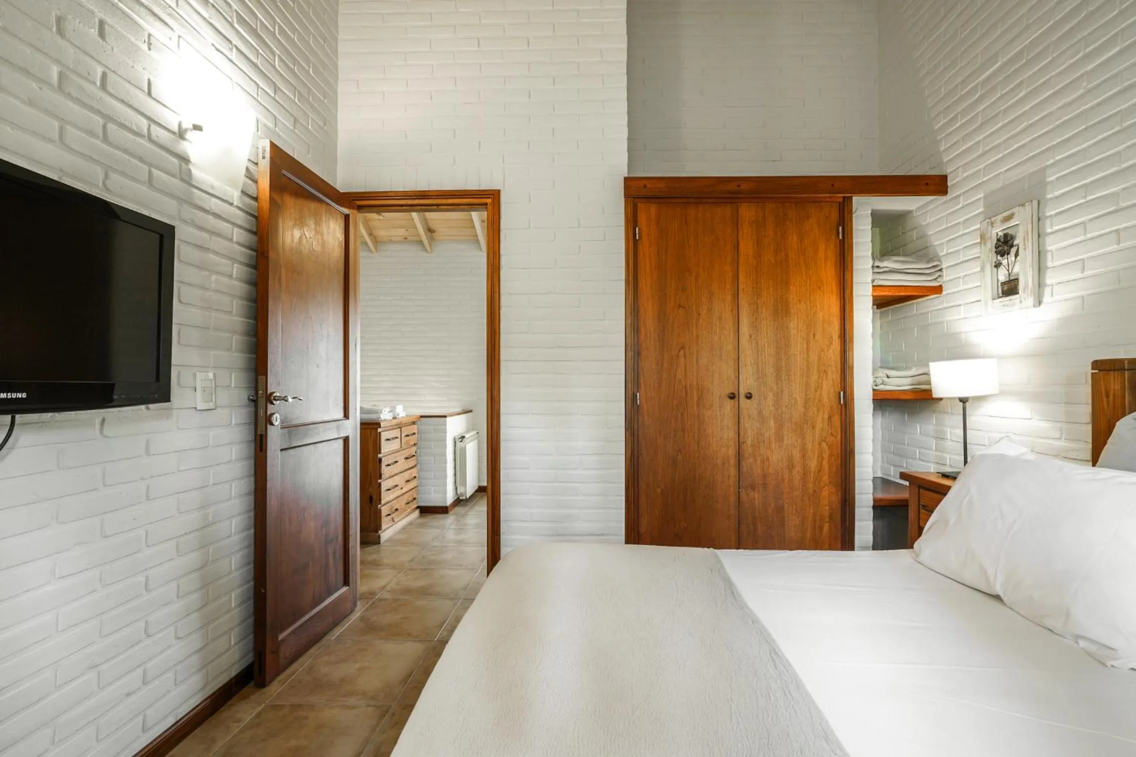 Bed in Valeria House Rental Suites