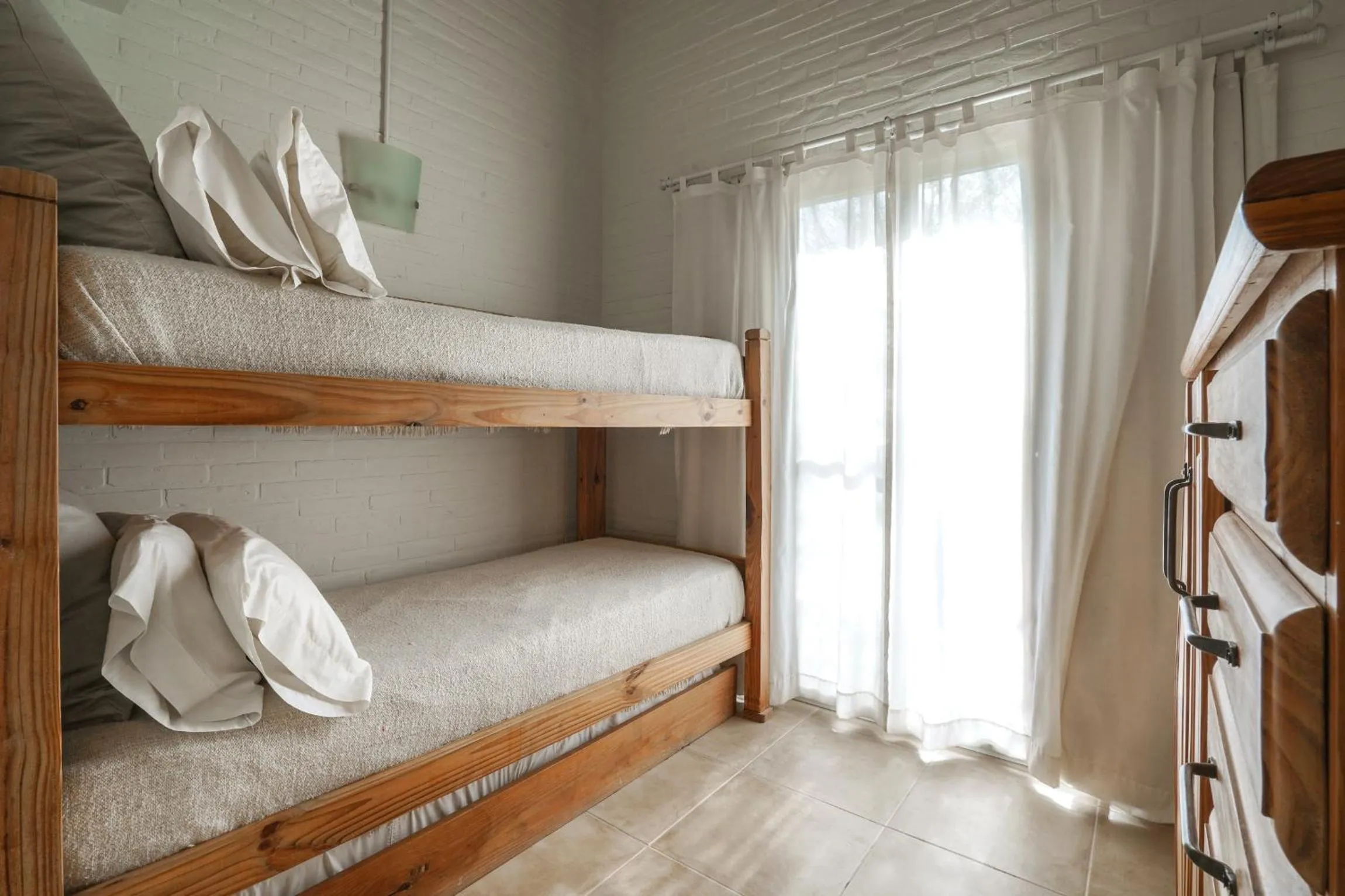 Bed in Valeria House Rental Suites