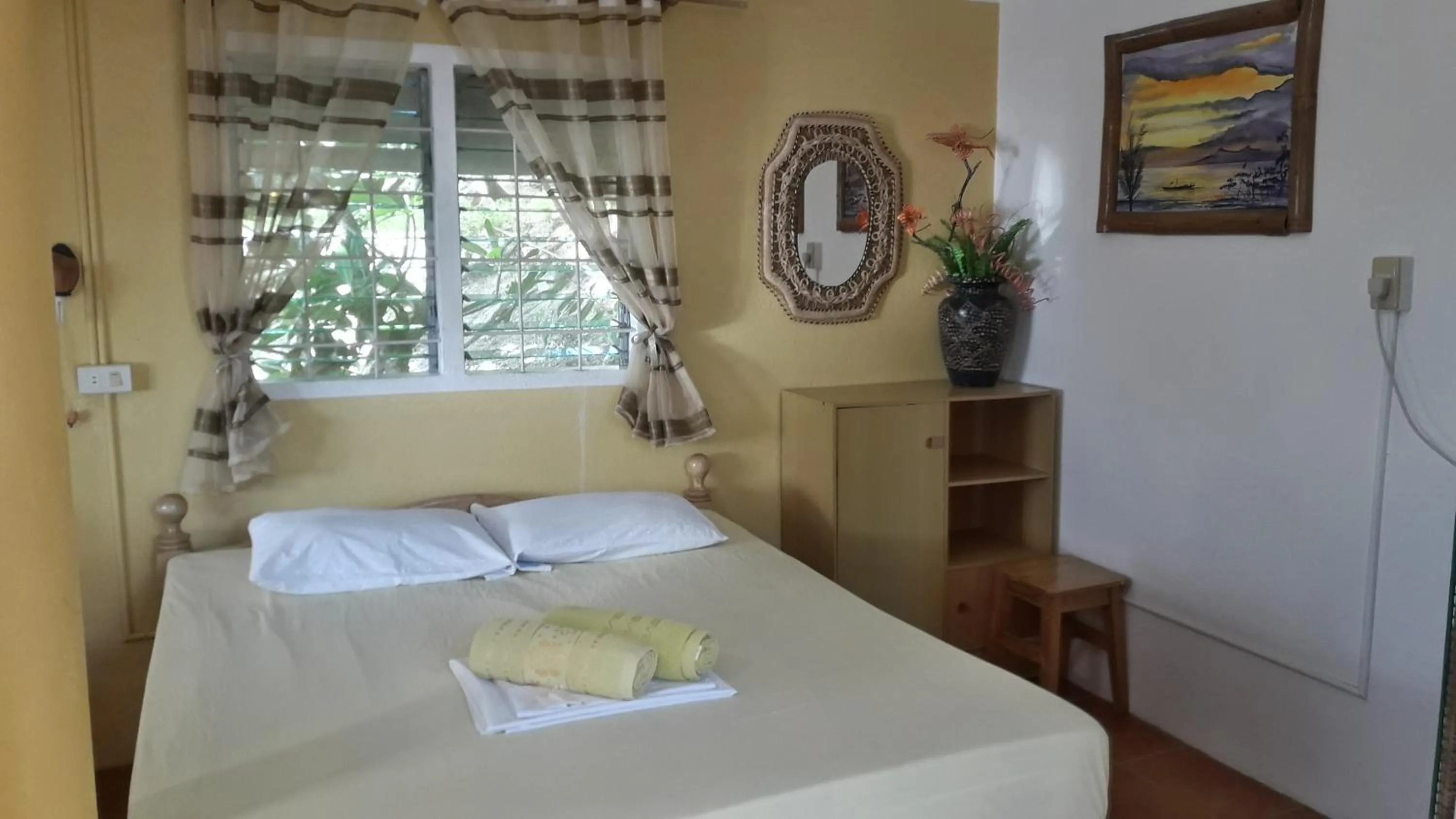 Bed in Casa de la Playa Beach Resort