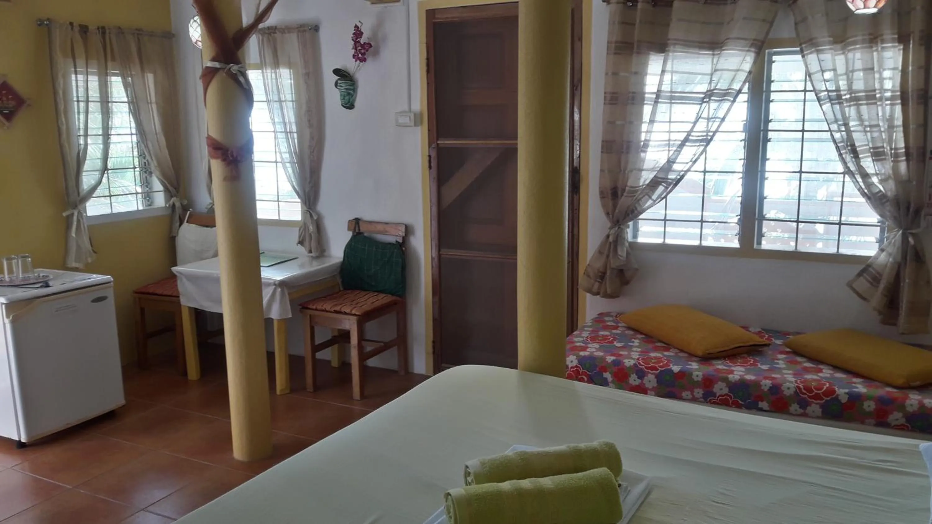 Bed in Casa de la Playa Beach Resort