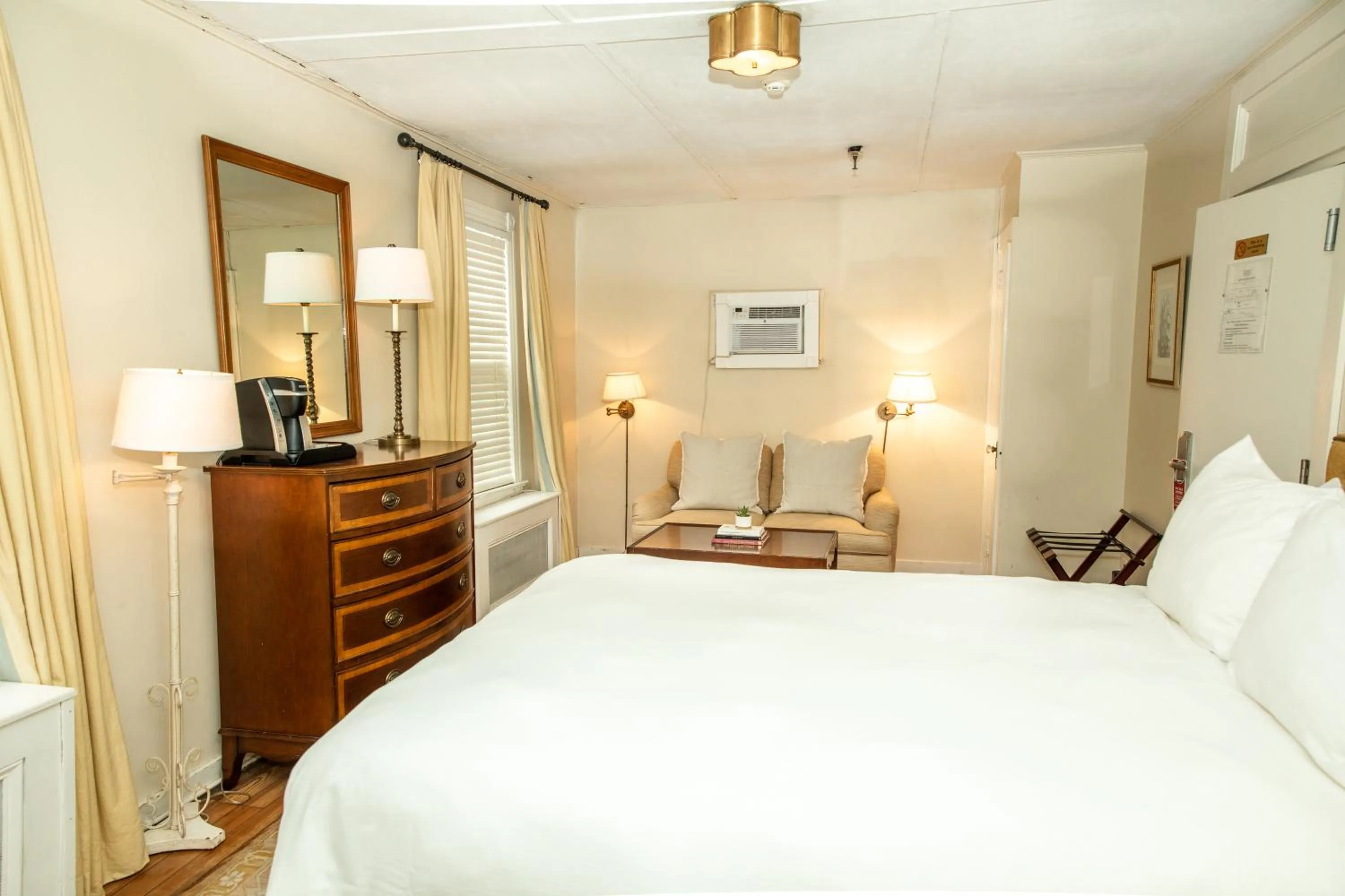 Bed in Three Village Inn