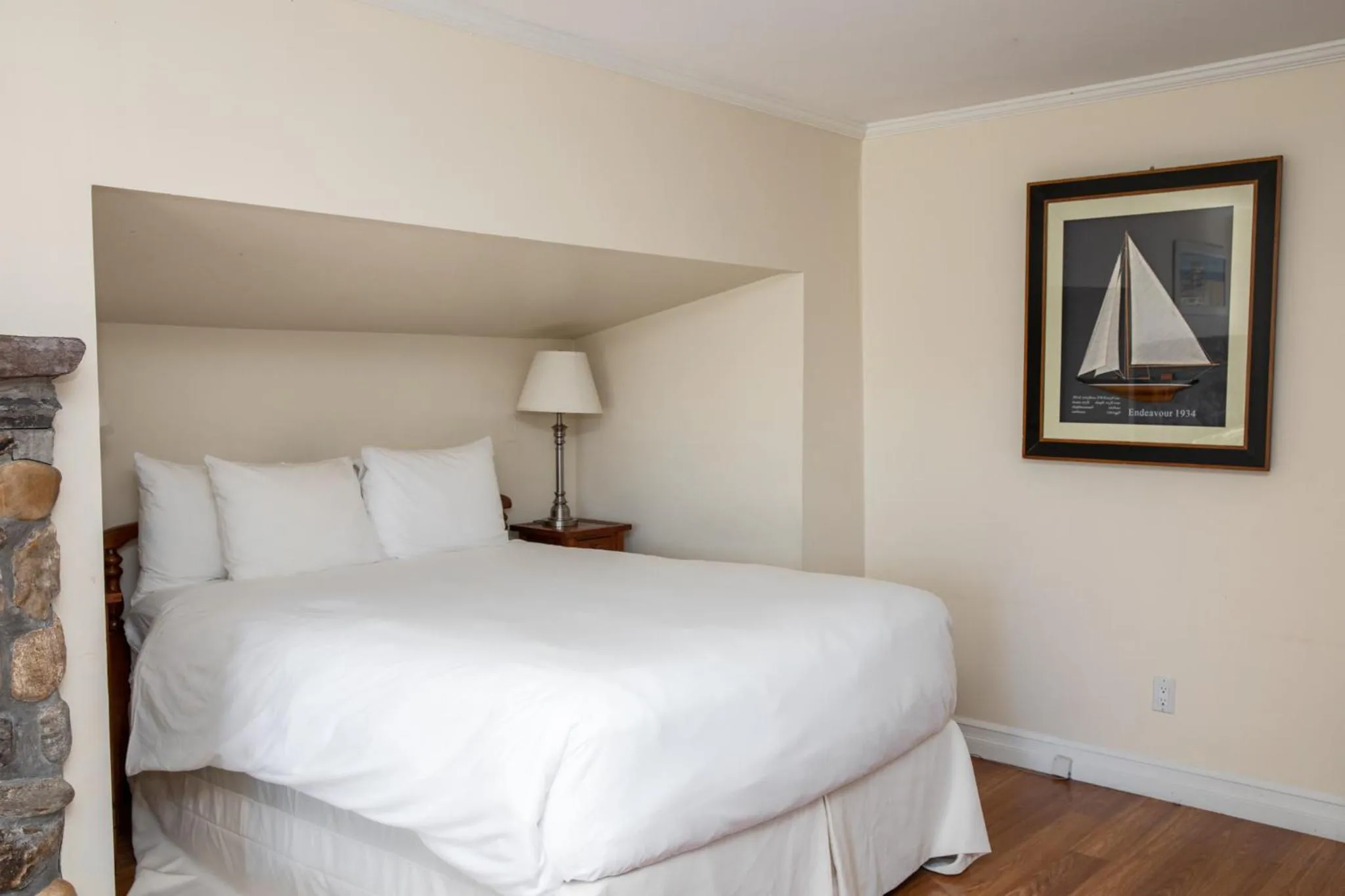 Bed in Three Village Inn