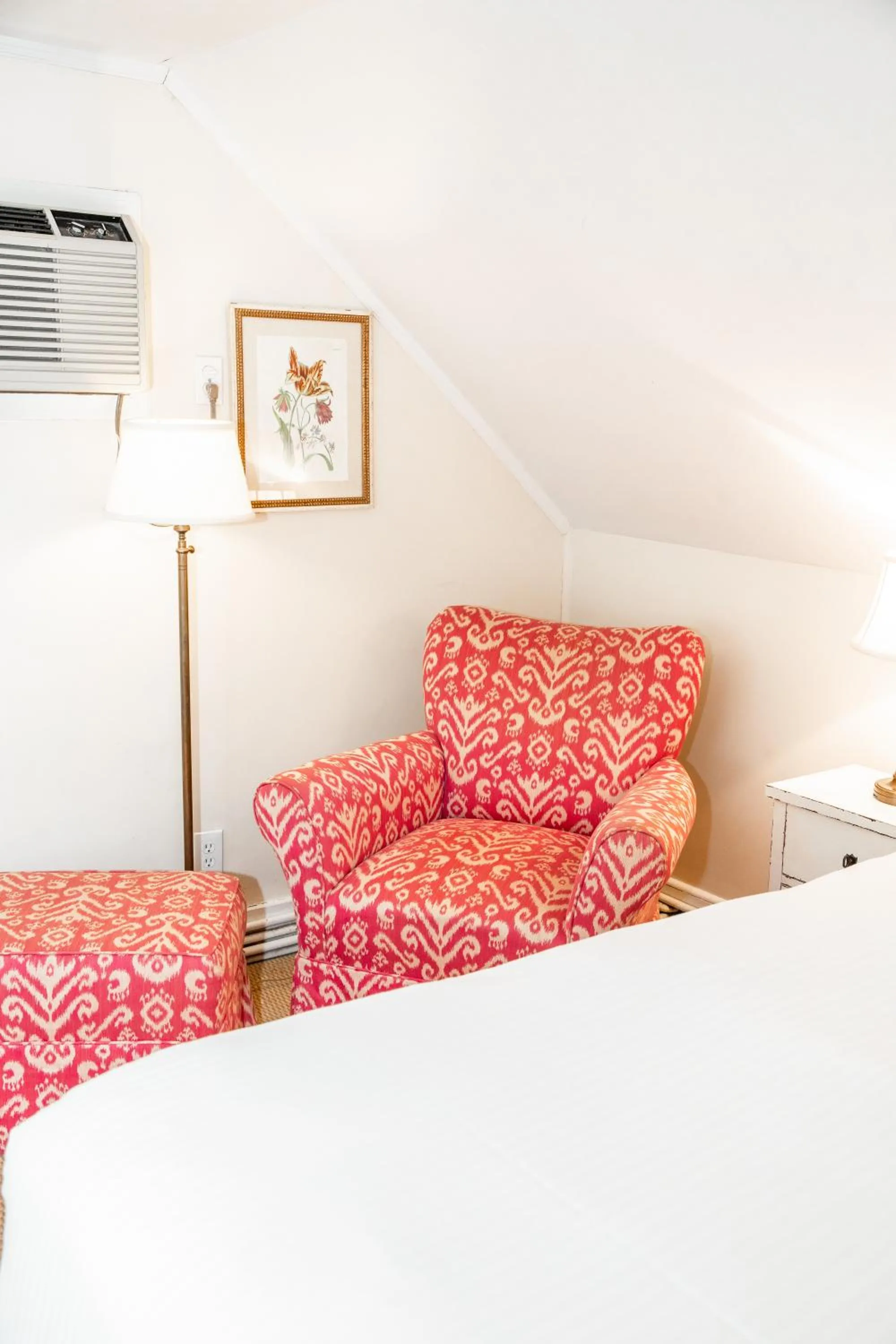 Bed in Three Village Inn