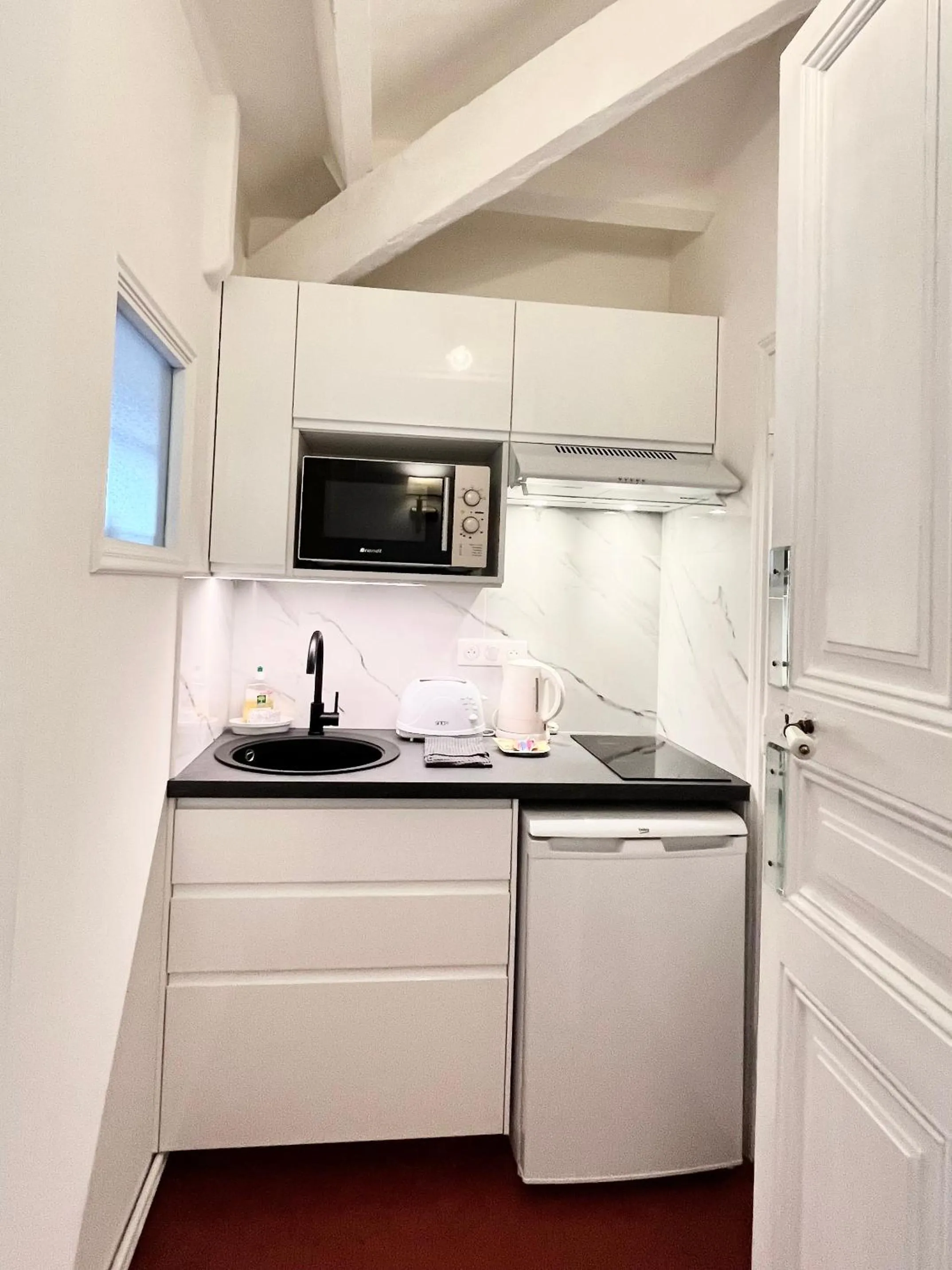 Kitchen or kitchenette in Résidence La Villa Léonie