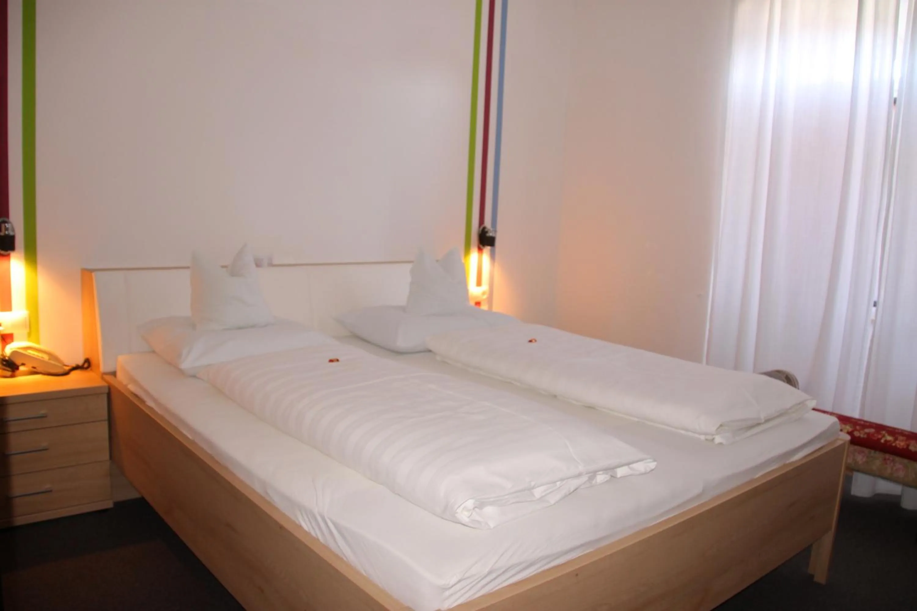 Photo of the whole room, Bed in Garni Brunnenhof