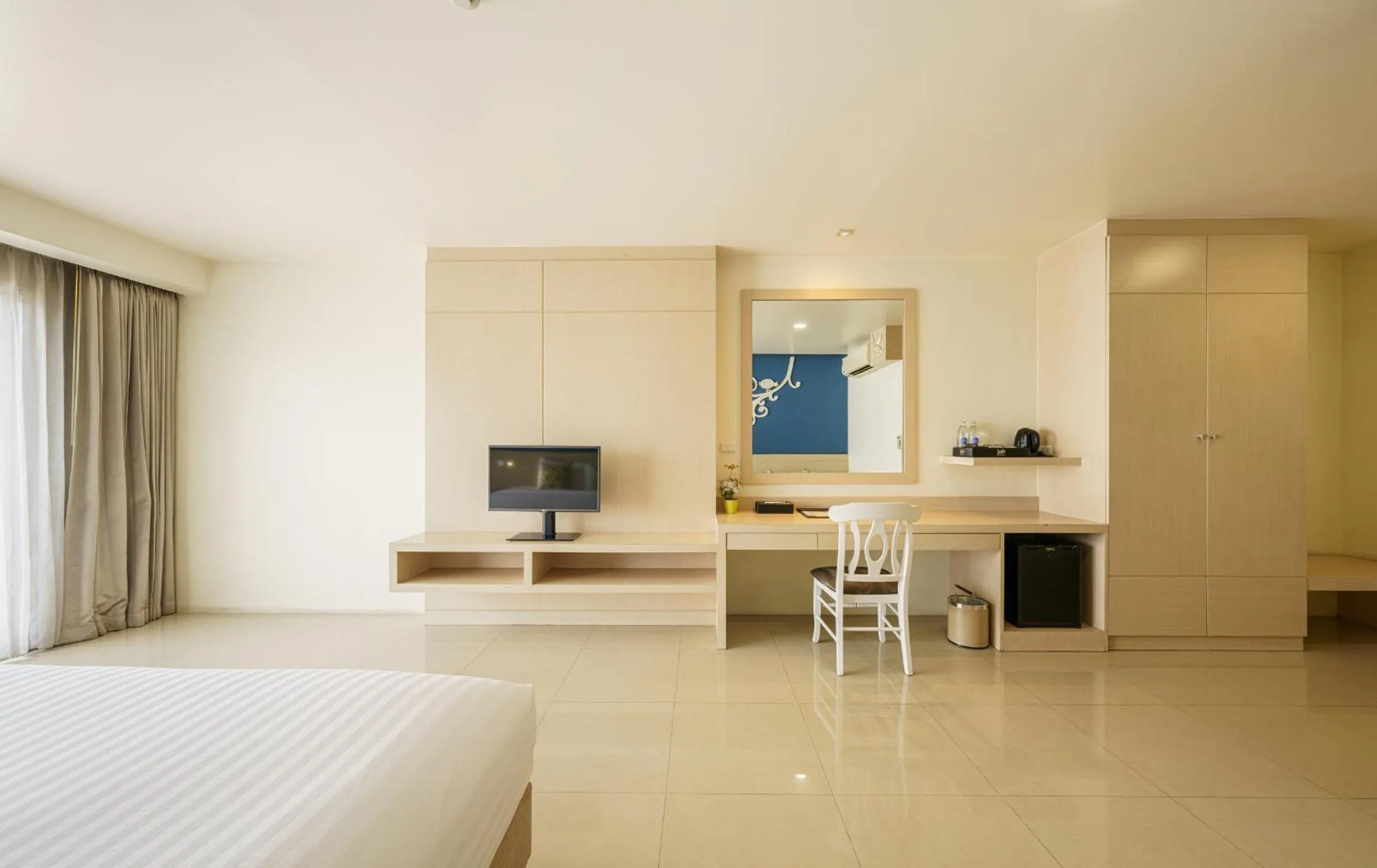 Bed in Jolly Suites&Spa Petkasem