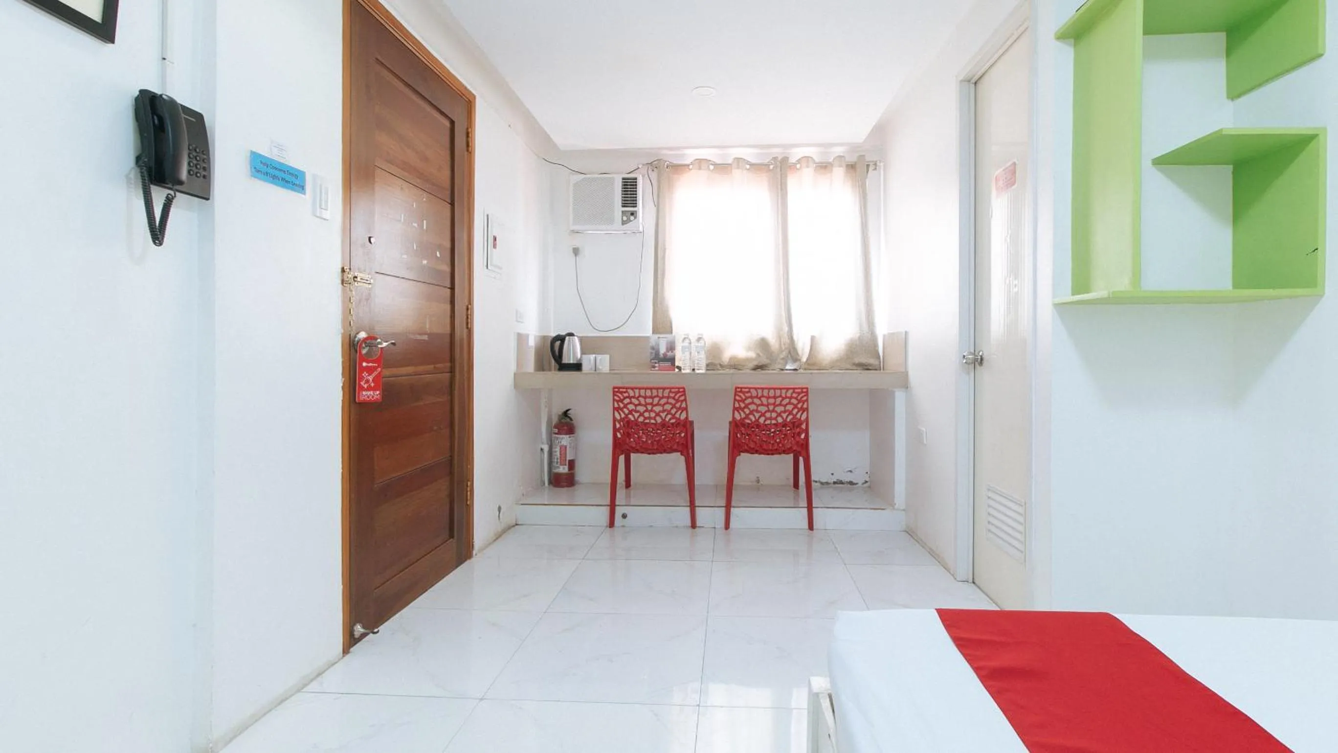 Photo of the whole room in RedDoorz at DBuilders Rooms Lower Bicutan