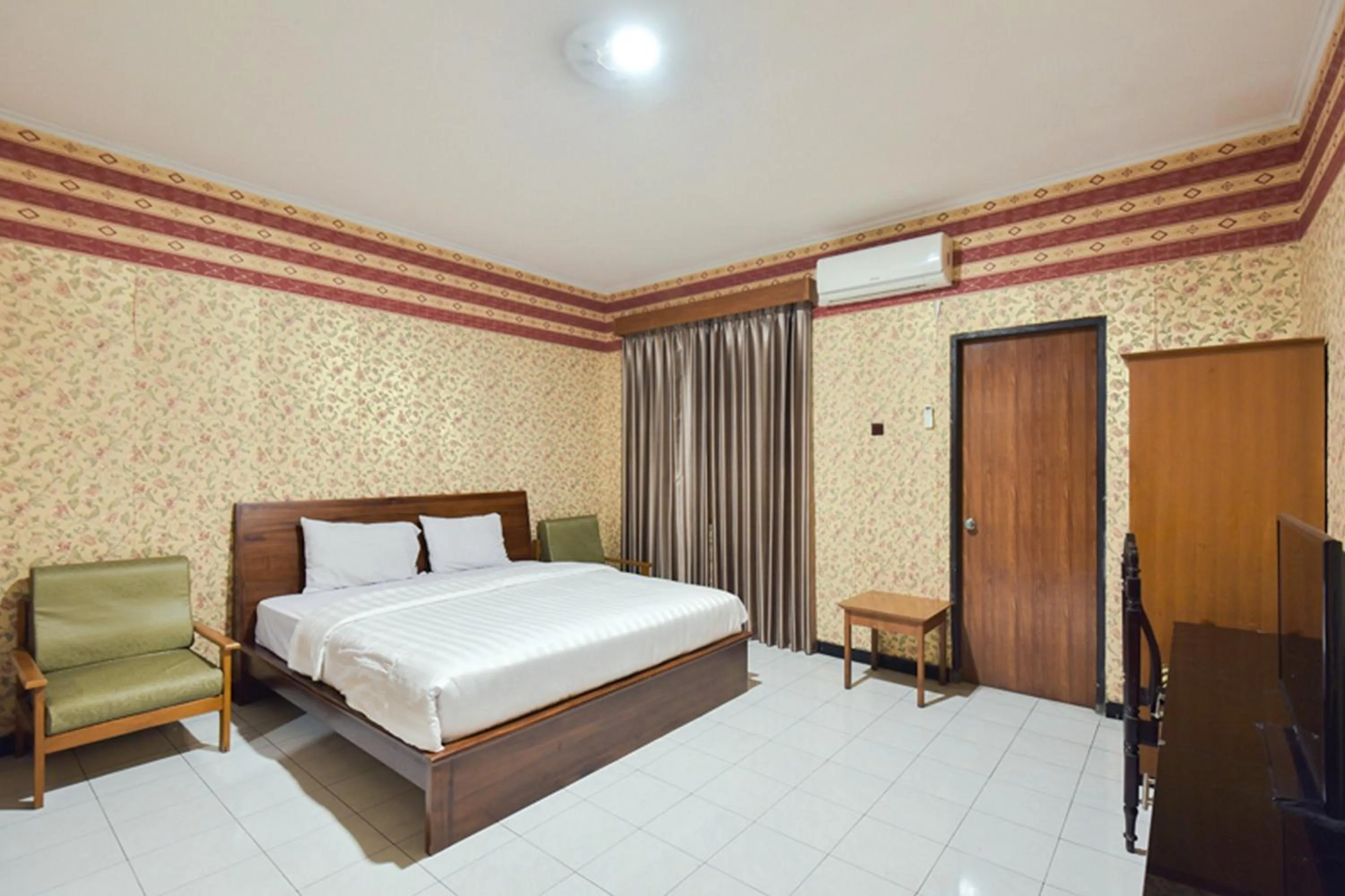 Bed in Sekar Ayu Hotel Malioboro Mitra RedDoorz