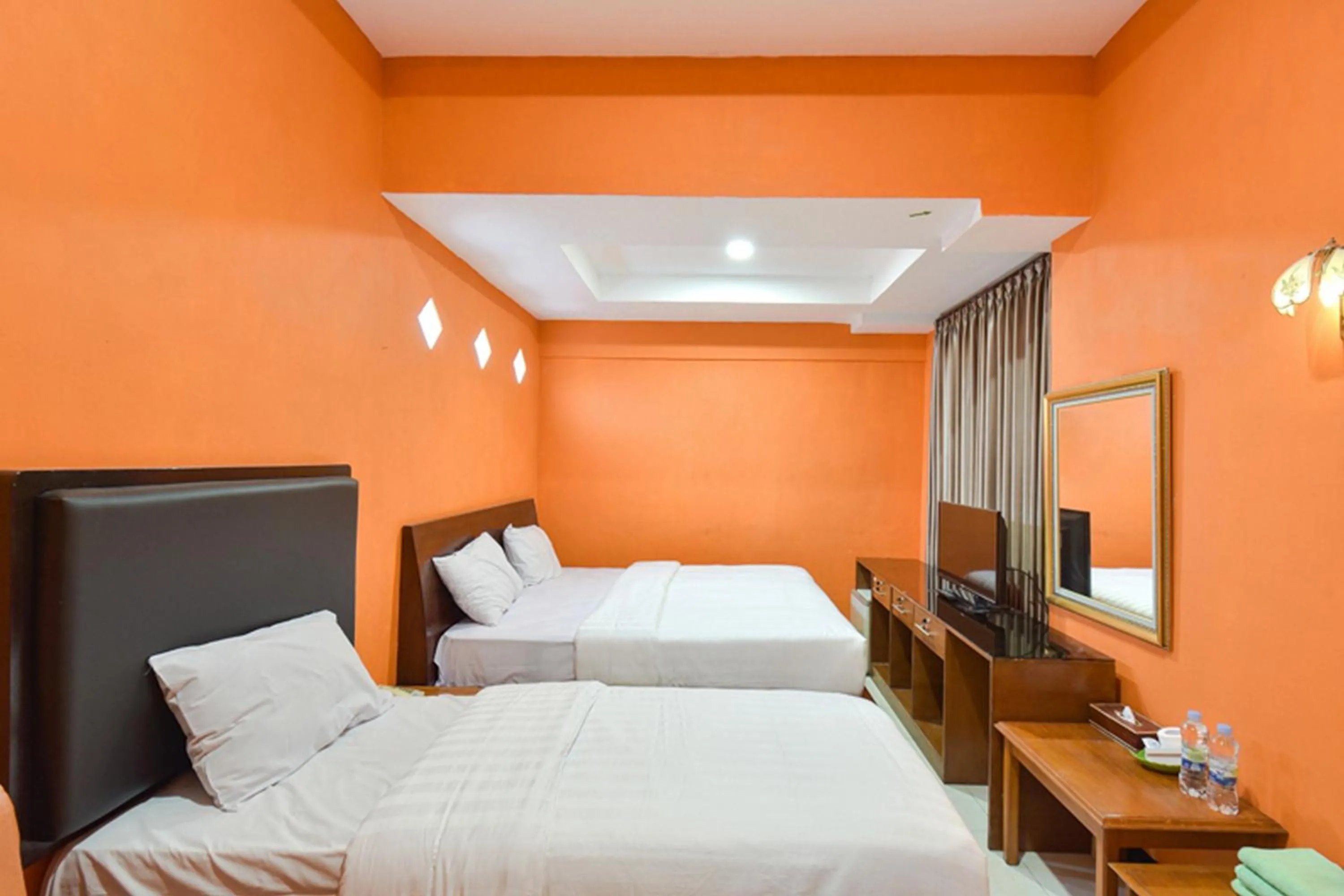 Bed in Sekar Ayu Hotel Malioboro Mitra RedDoorz