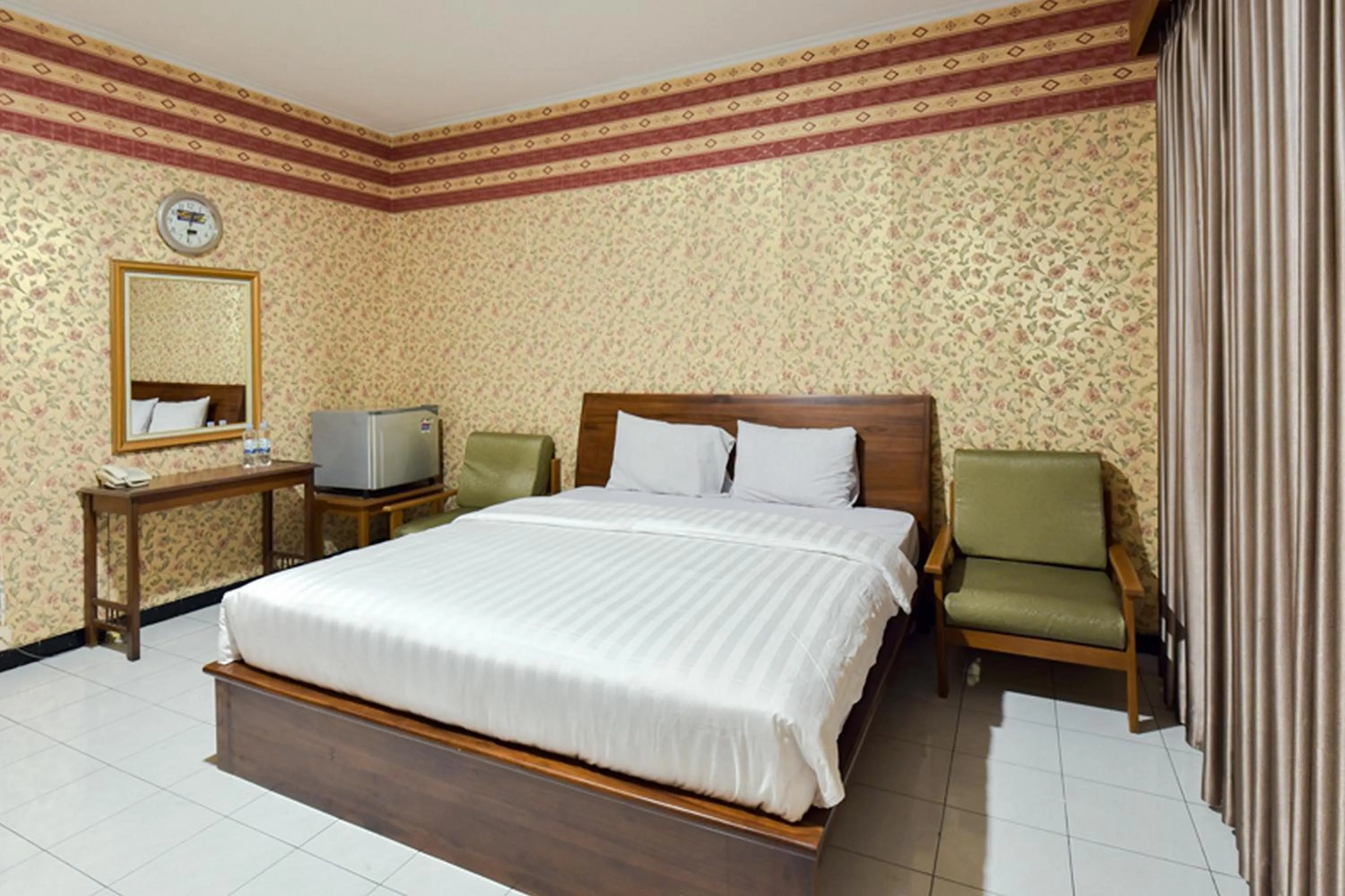 Bed in Sekar Ayu Hotel Malioboro Mitra RedDoorz