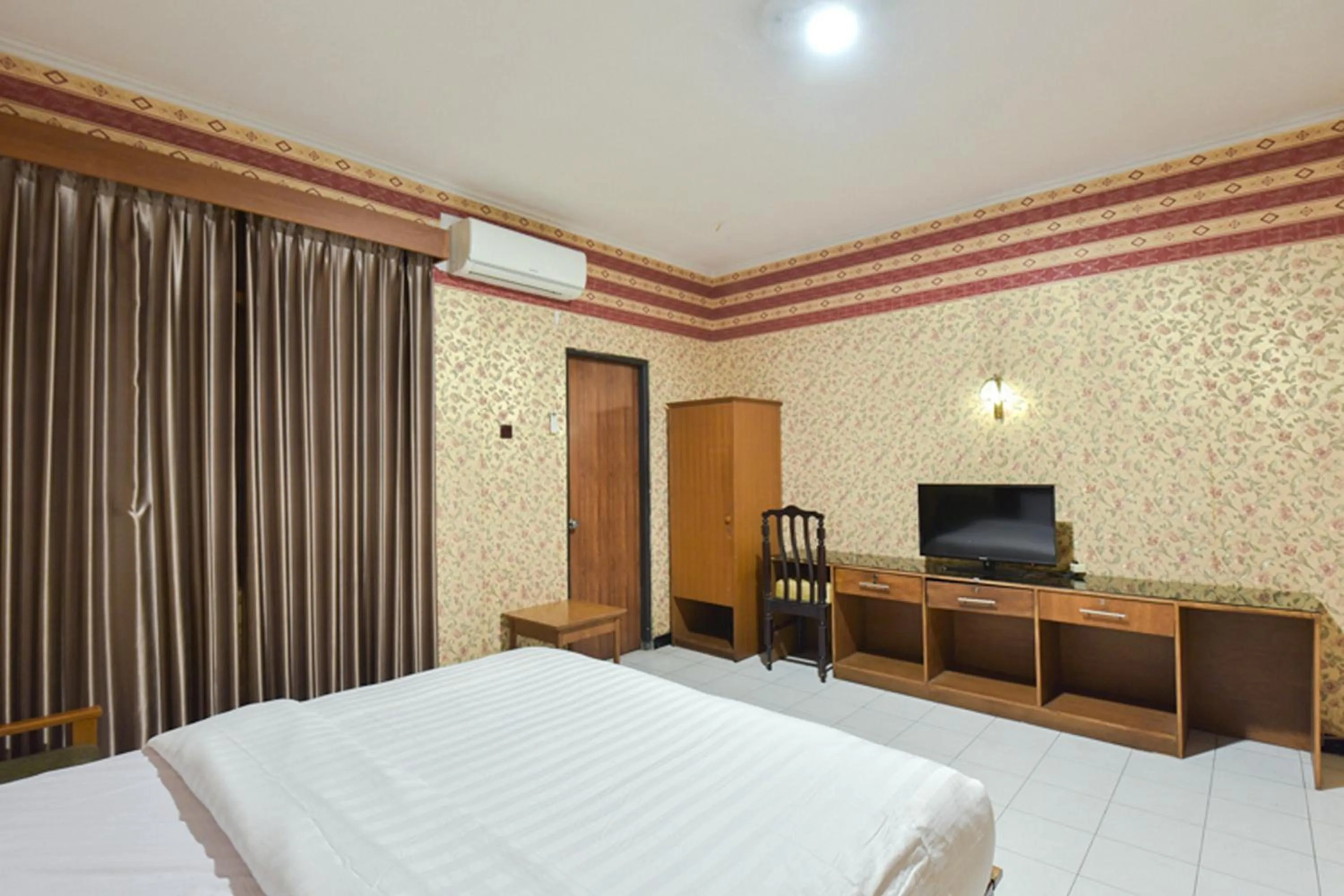 Bed in Sekar Ayu Hotel Malioboro Mitra RedDoorz