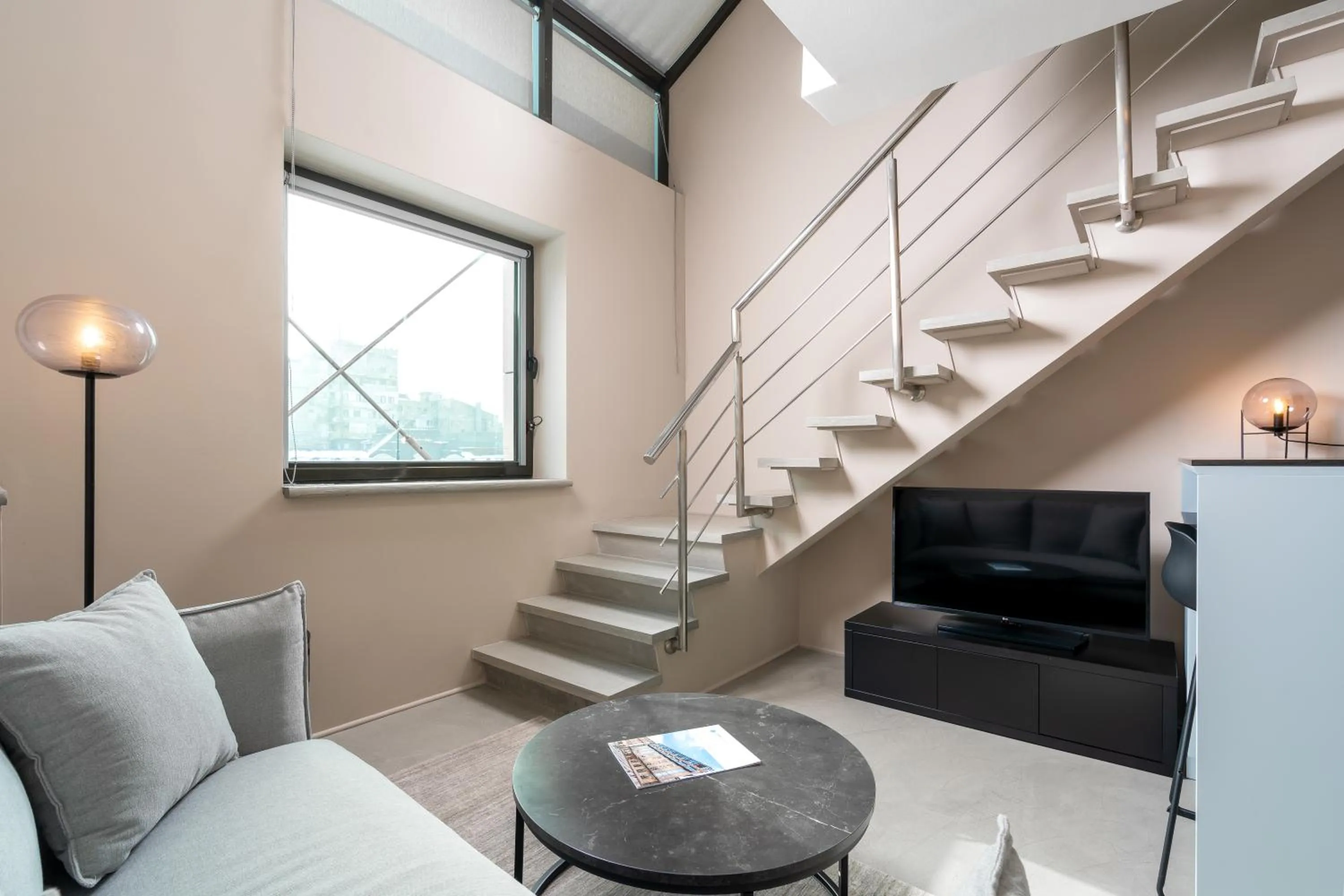 Living room in VISIONAPARTMENTS Bucharest - contactless check-in