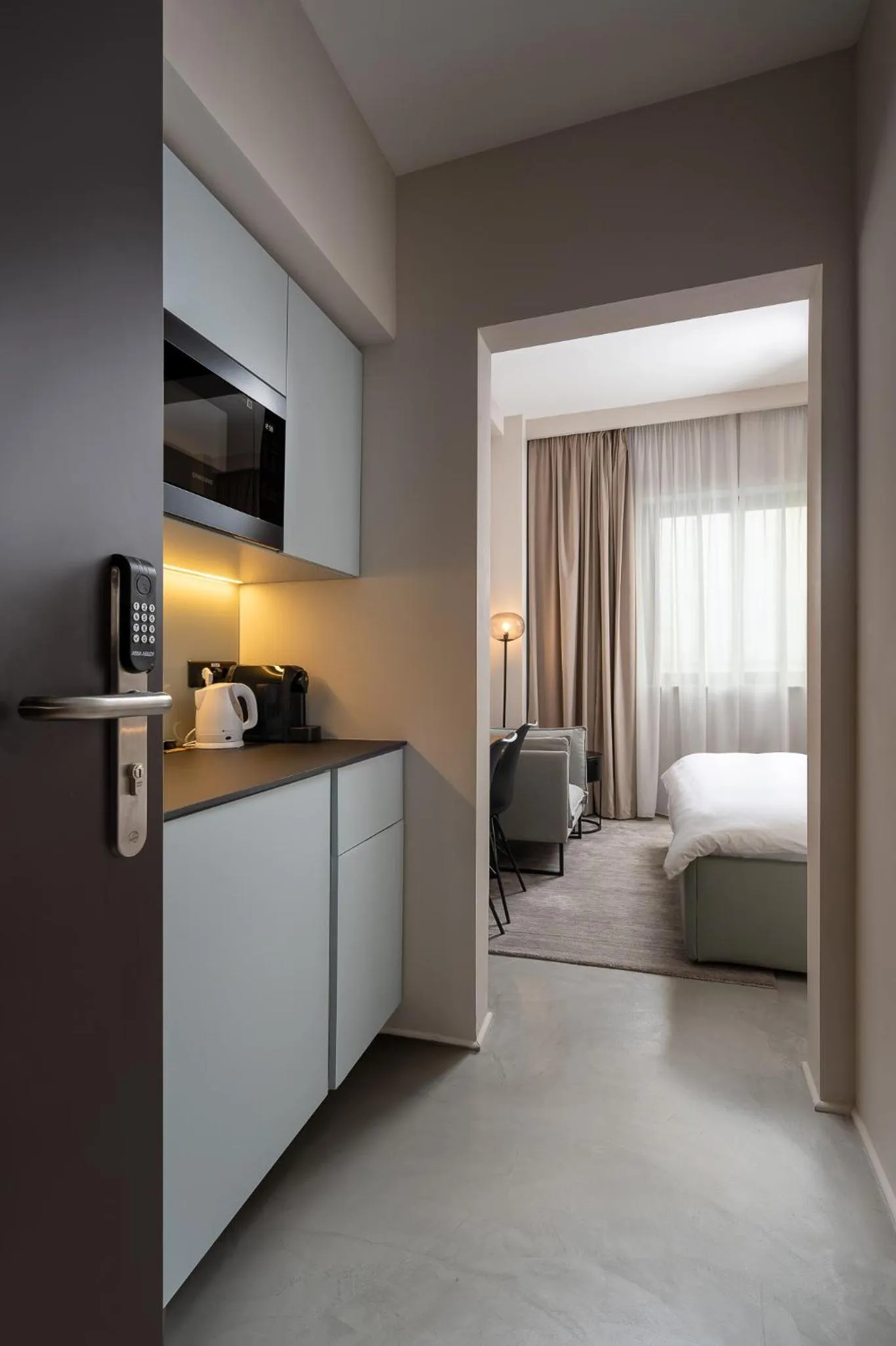 Kitchen or kitchenette, Bed in VISIONAPARTMENTS Bucharest - contactless check-in