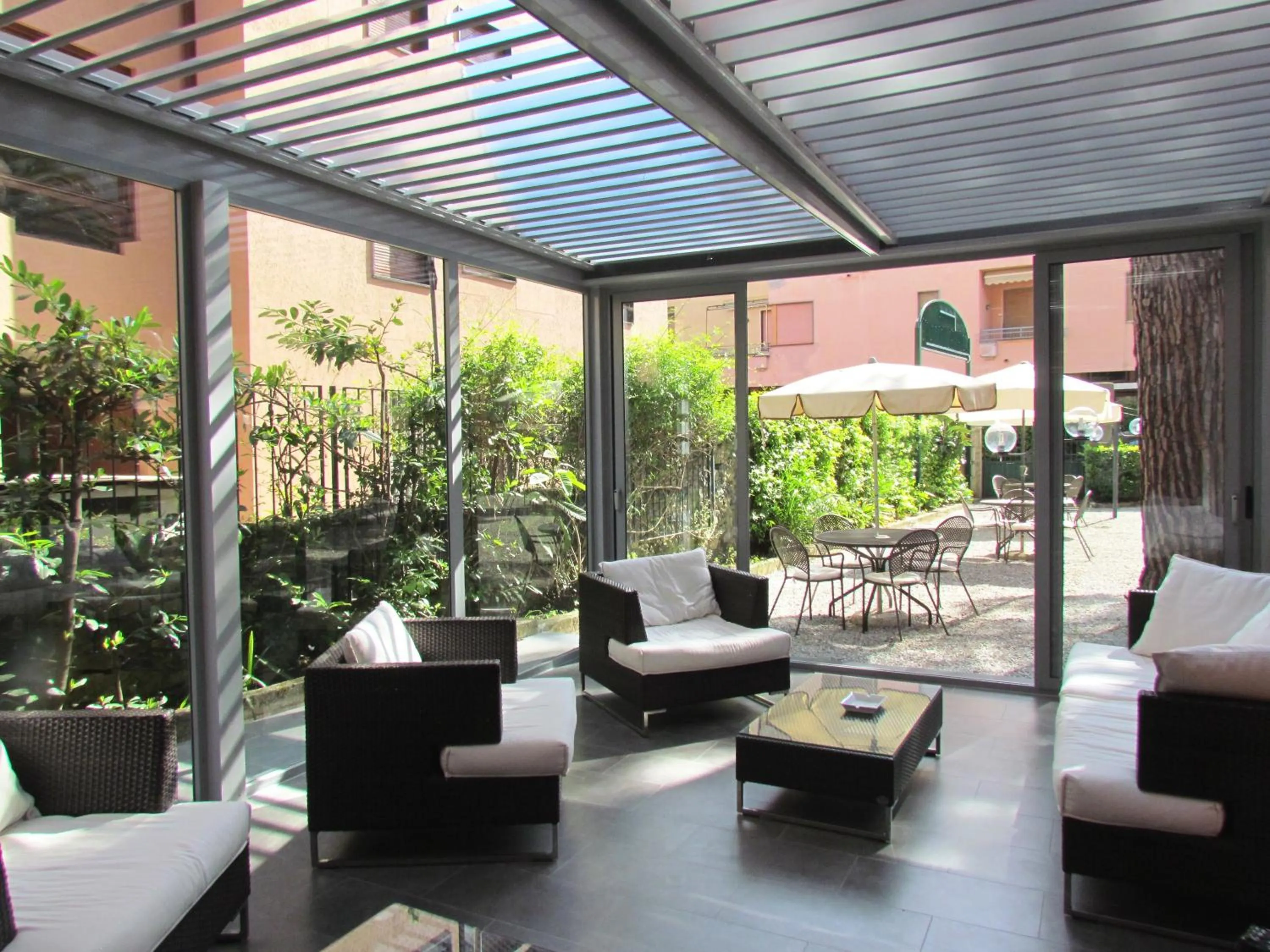 Communal lounge/ TV room in Hotel Palme