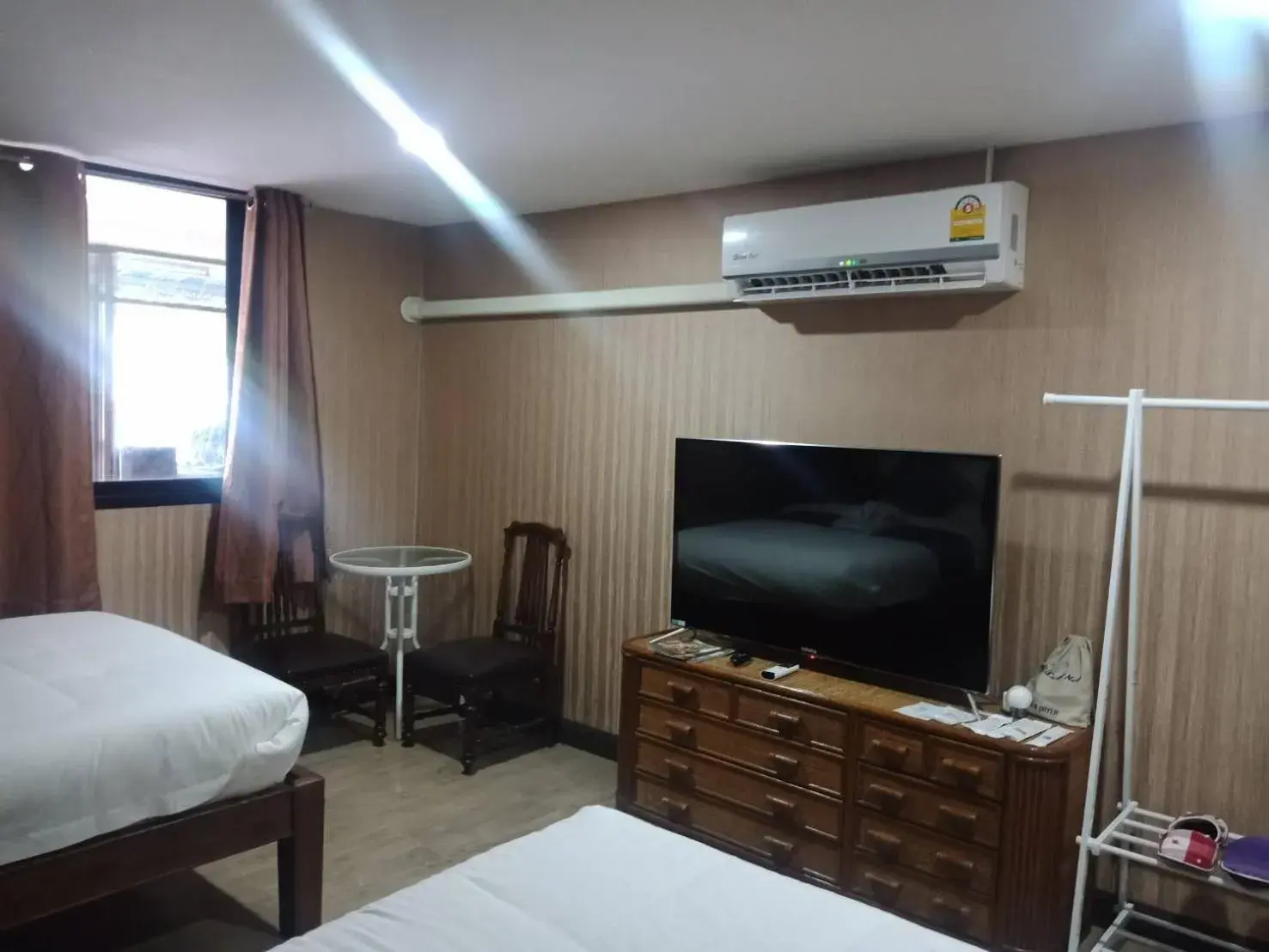 Bed in A Lanna Boutique House Bed in A Lanna Boutique House